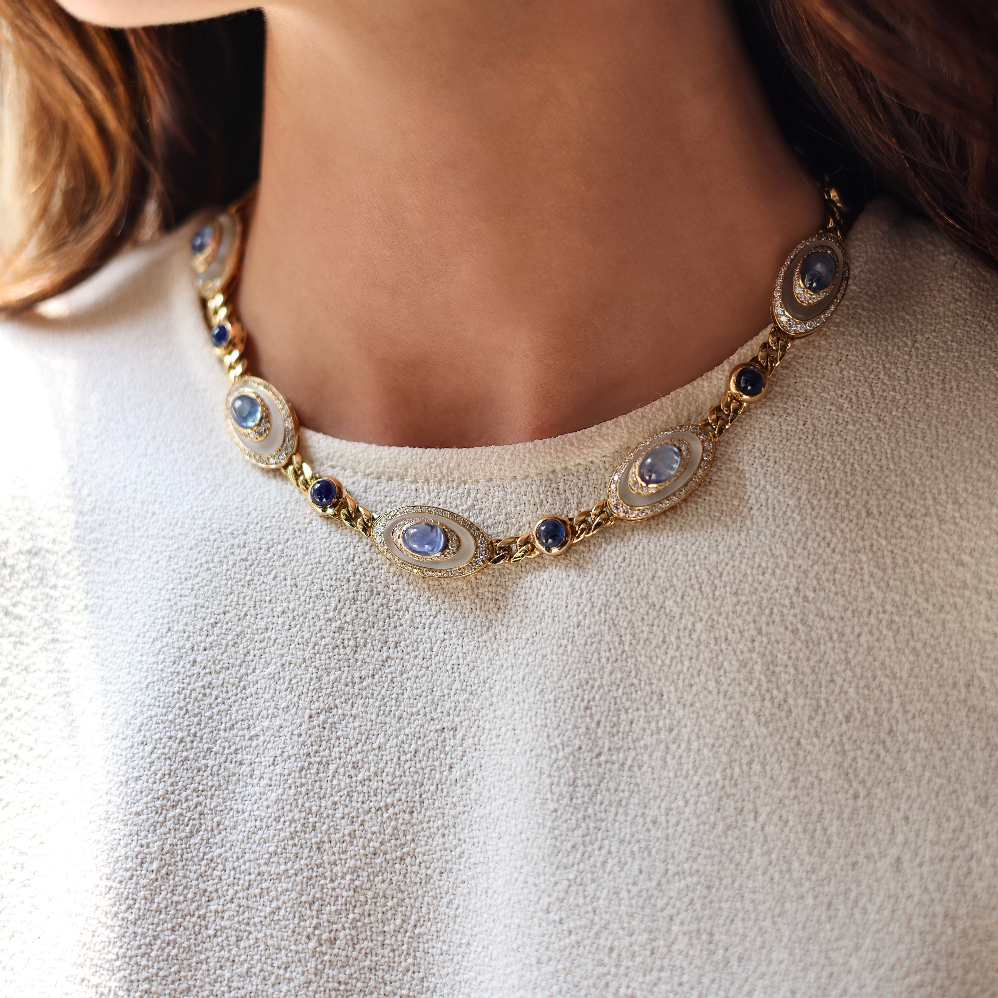 Vintage Bvlgari necklace in 18K yellow gold with carved rock crystal, sapphire, and diamond stations all the way around