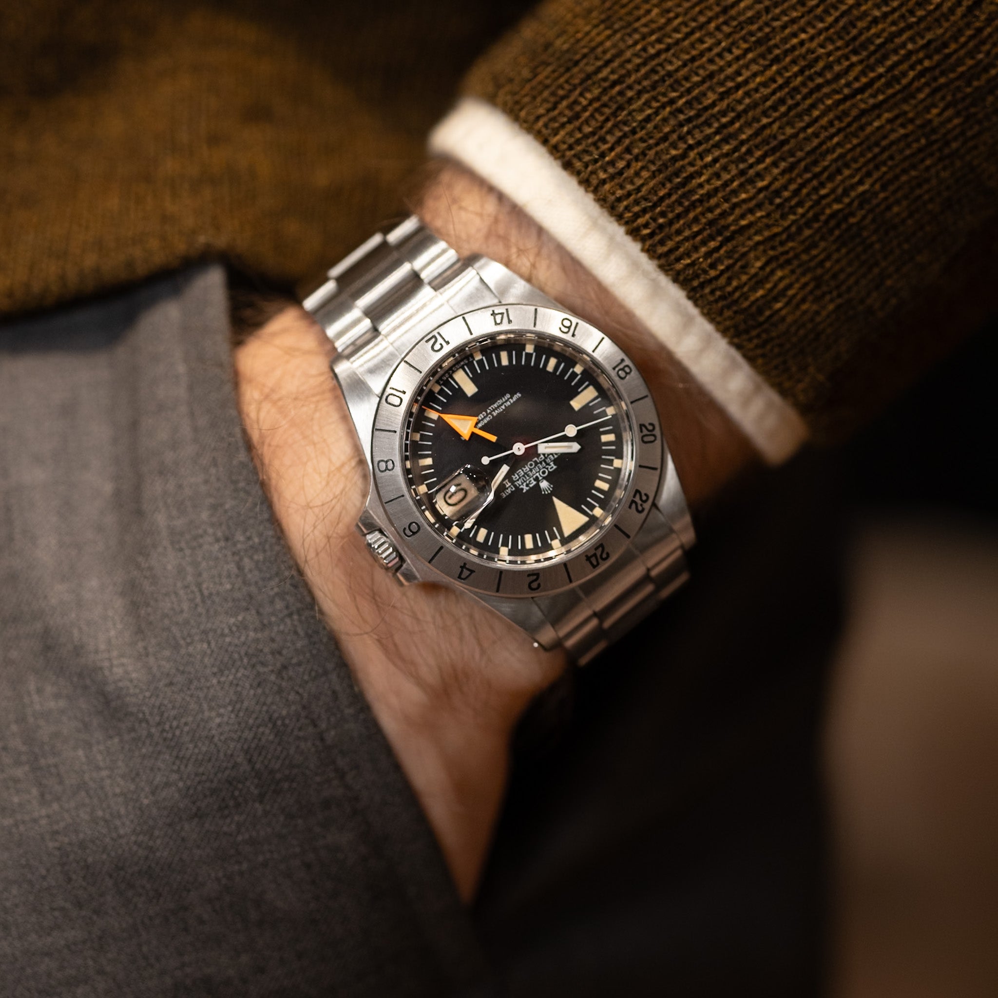 Rolex Explorer II Ref 1655 stainless steel case front view on black dial on figure