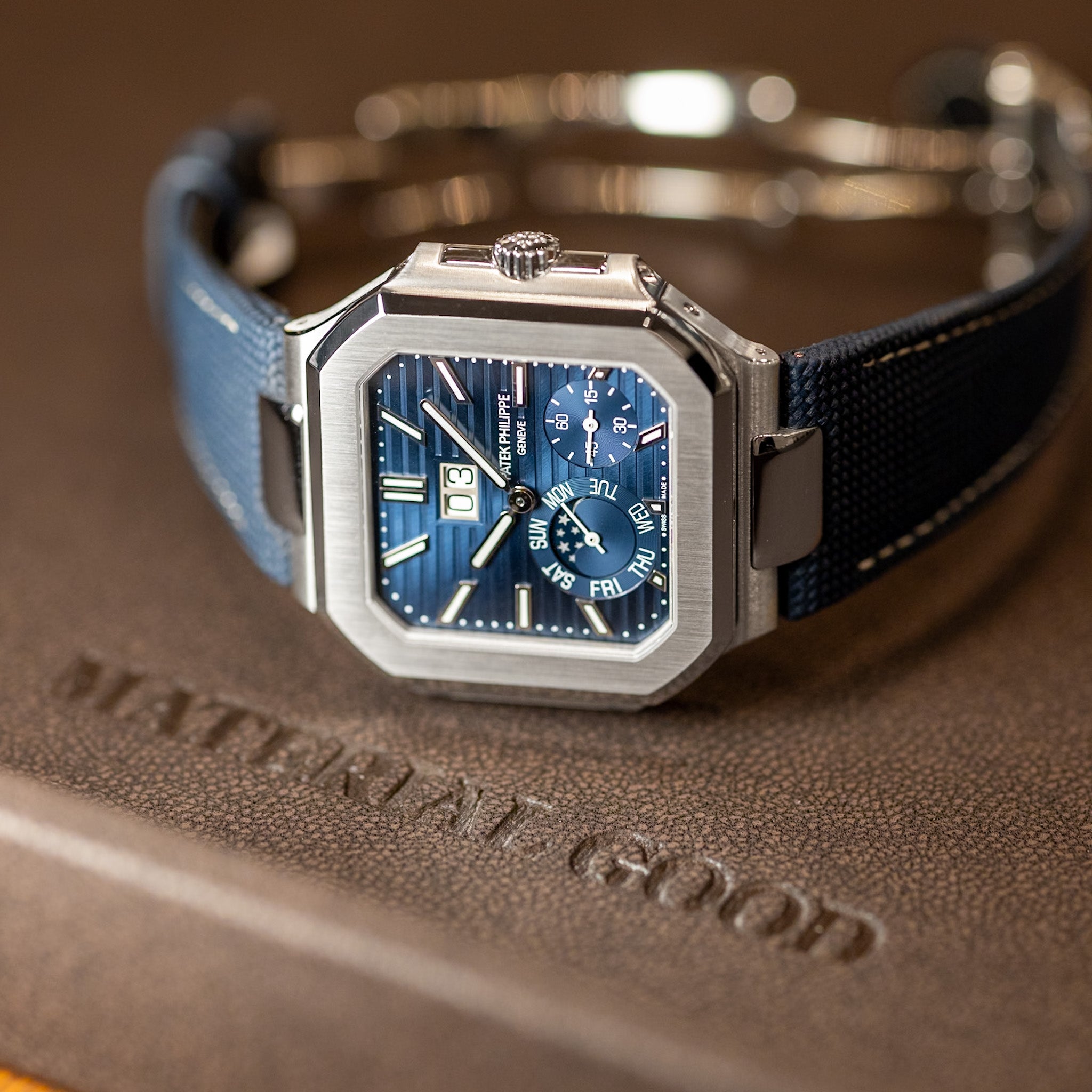 Patek Philippe Cubitus 5822P-001 platinum moonphase watch on rubber strap, full dial view