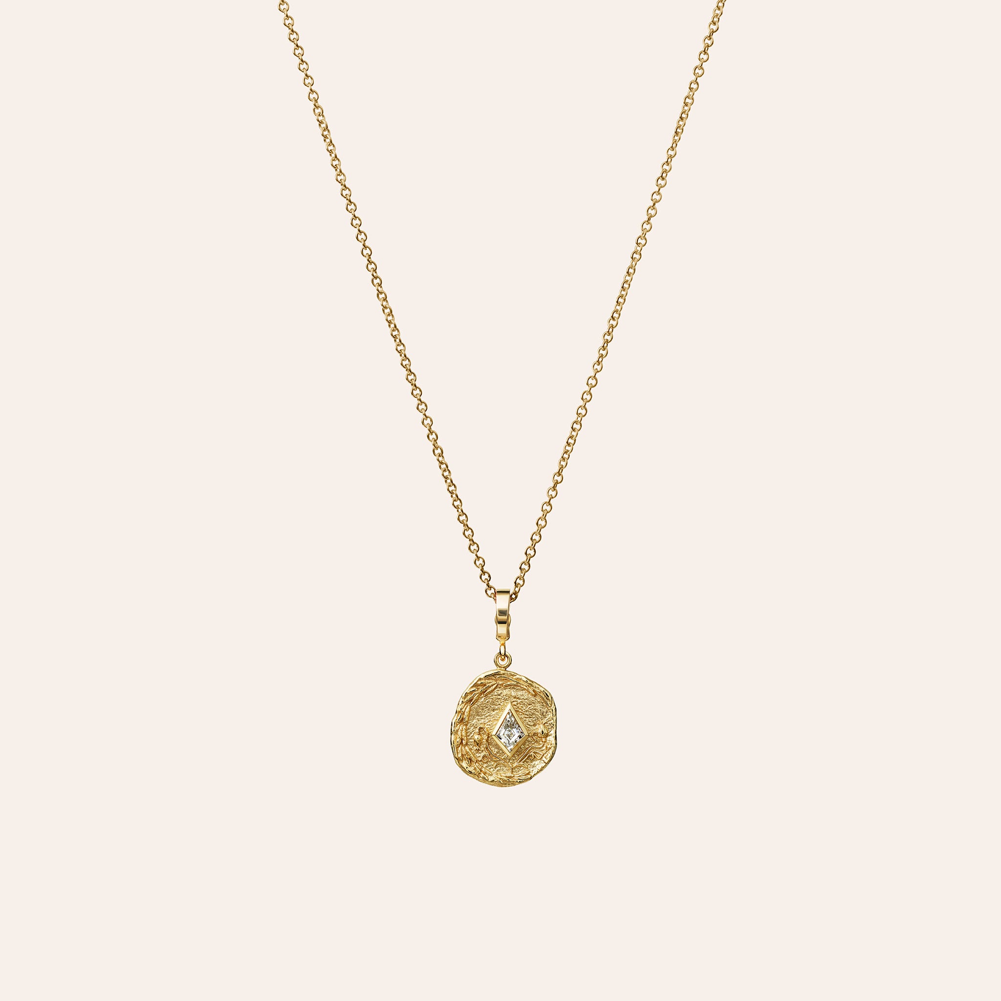 Āzlee Small Olive Branch & Rose Bud Kite Diamond Coin Charm in 18K yellow gold on a thin cable chain, on an ivory background