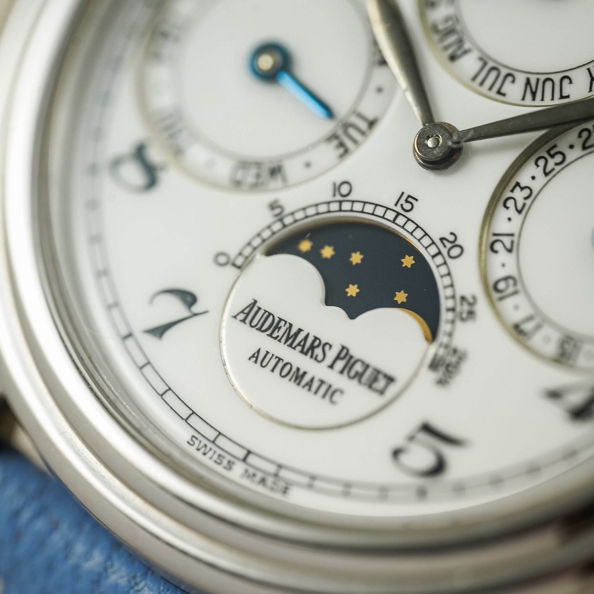 Close-up of a watch face with 'Audemars Piguet' branding