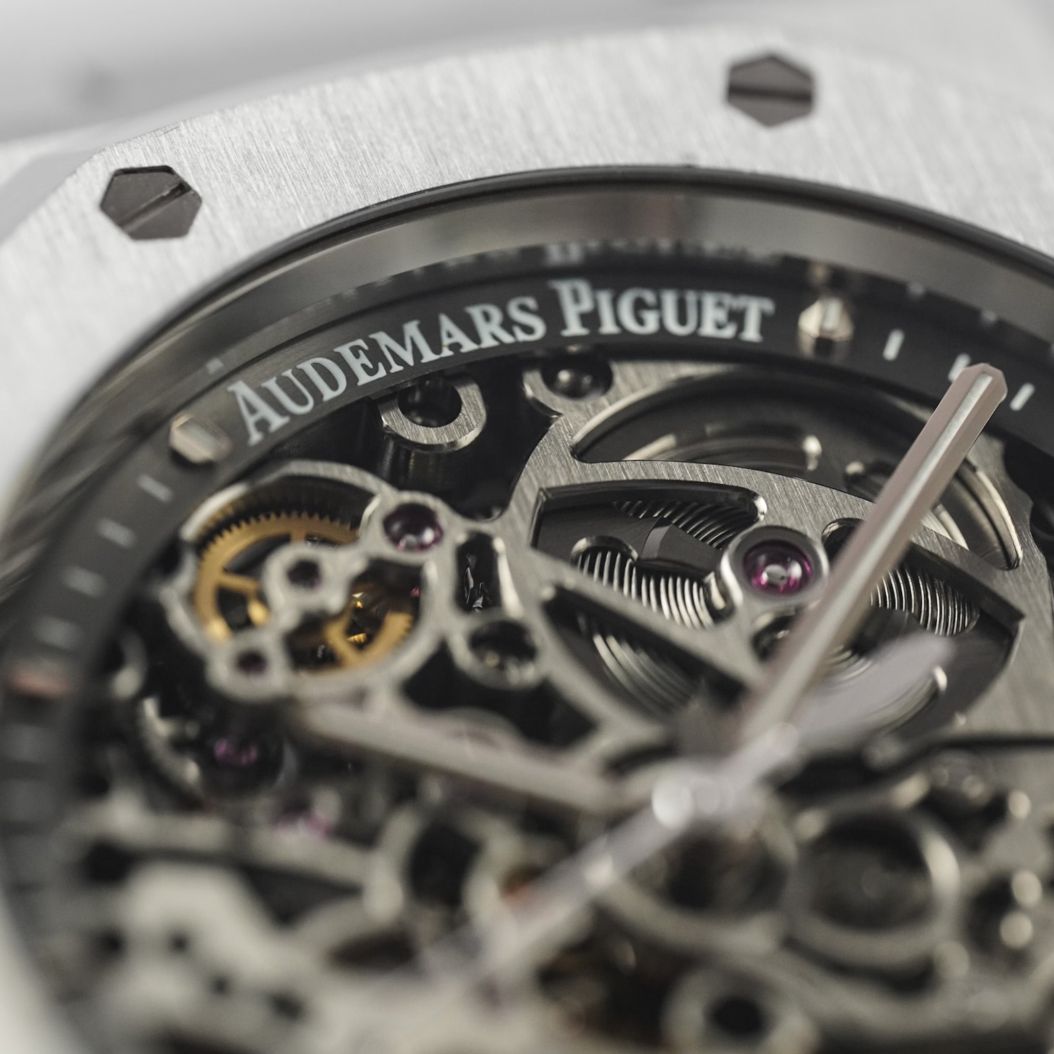 Close-up of a watch mechanism with 'Audemars Piguet' branding.