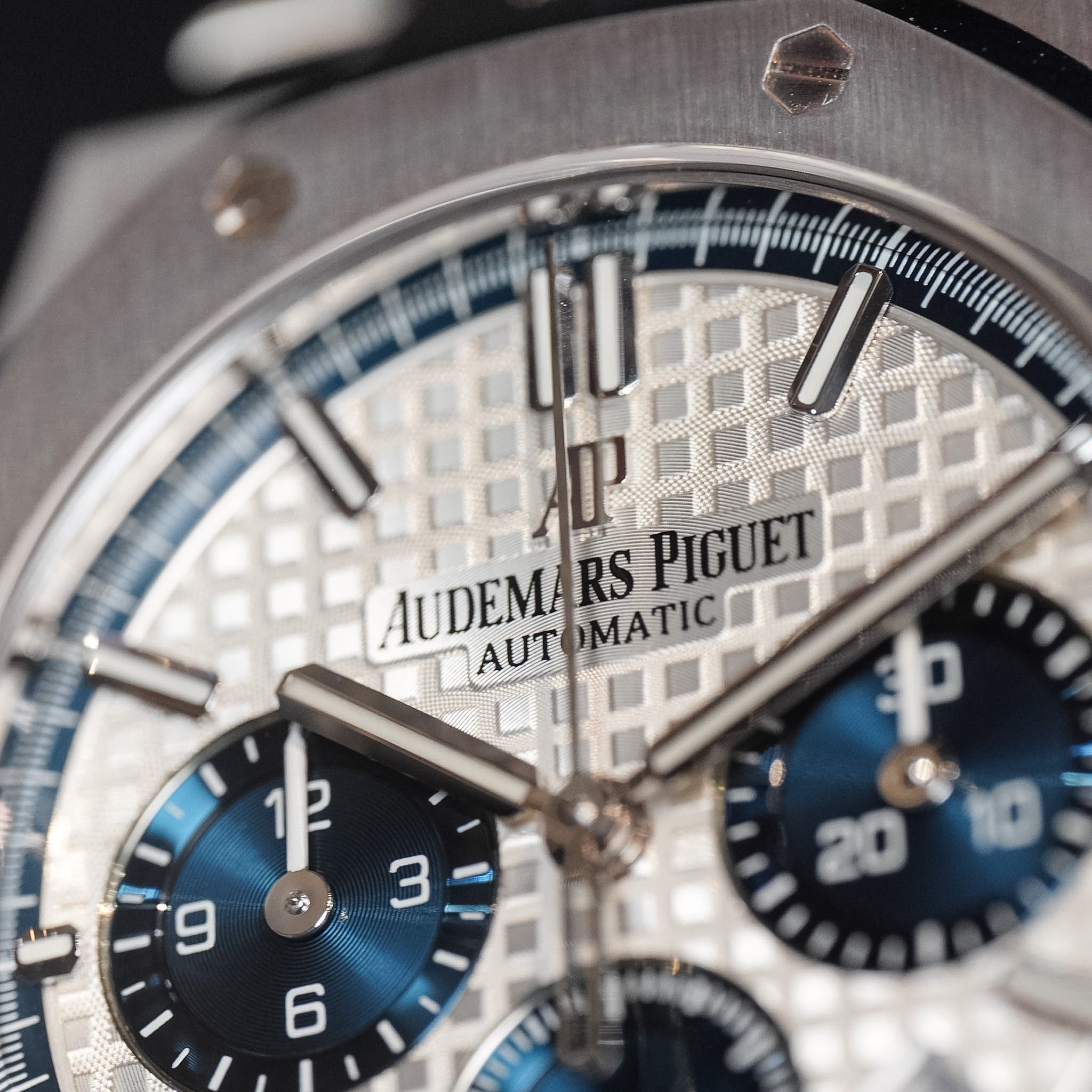 Close-up of a luxury watch with 'Audemars Piguet' branding