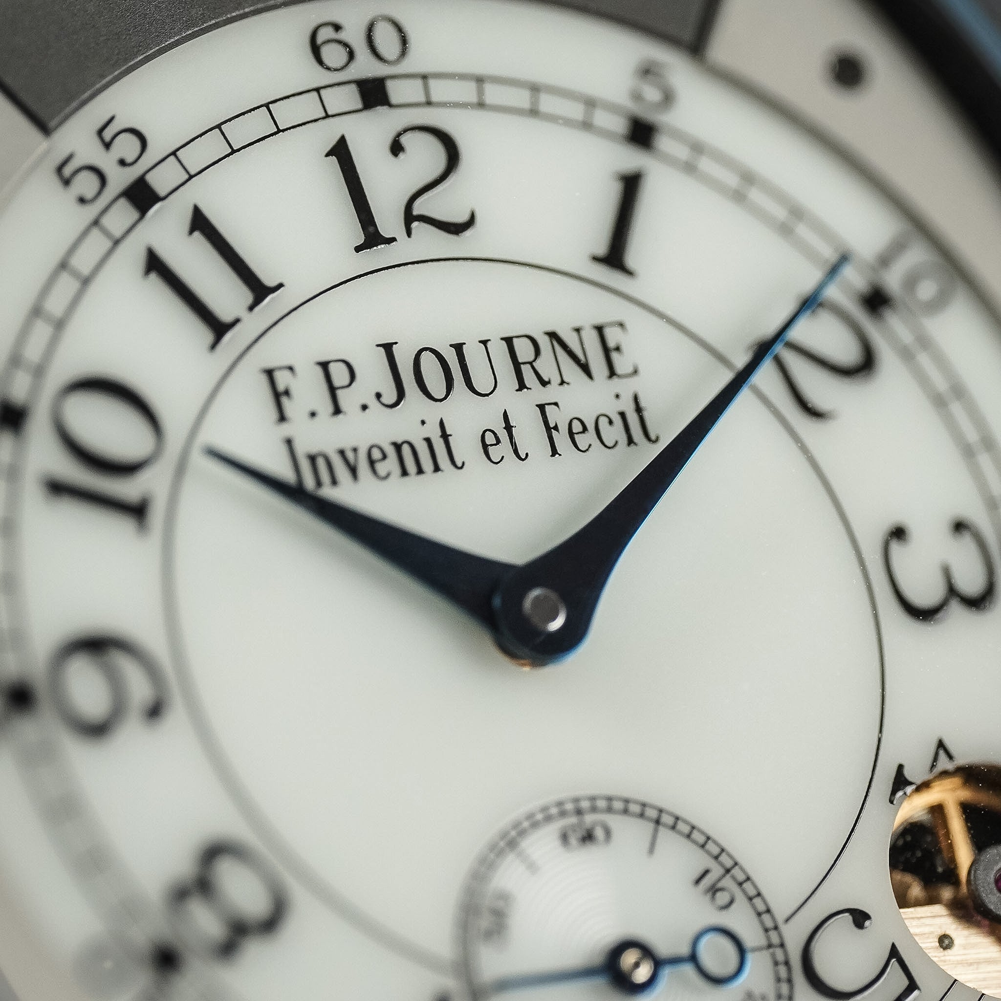 Close up of a white F.P.Journe Elegante dial with black typography