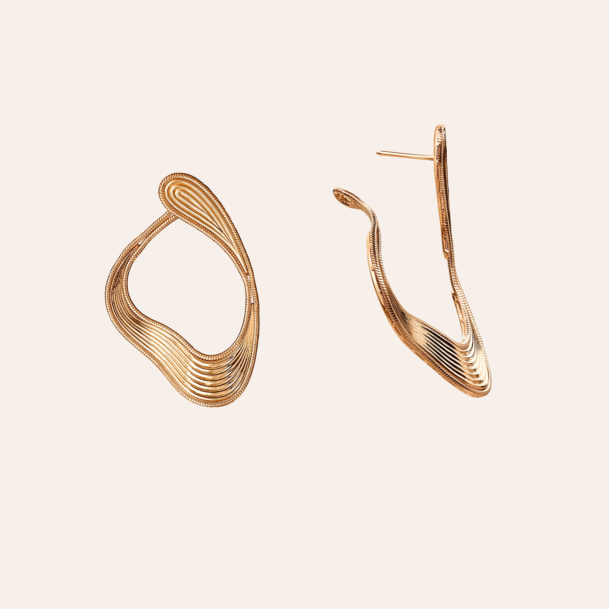 Fernando Jorge Stream Lines Medium Loop Earrings in 18K rose gold, sculptural line earrings that wrap from front to back