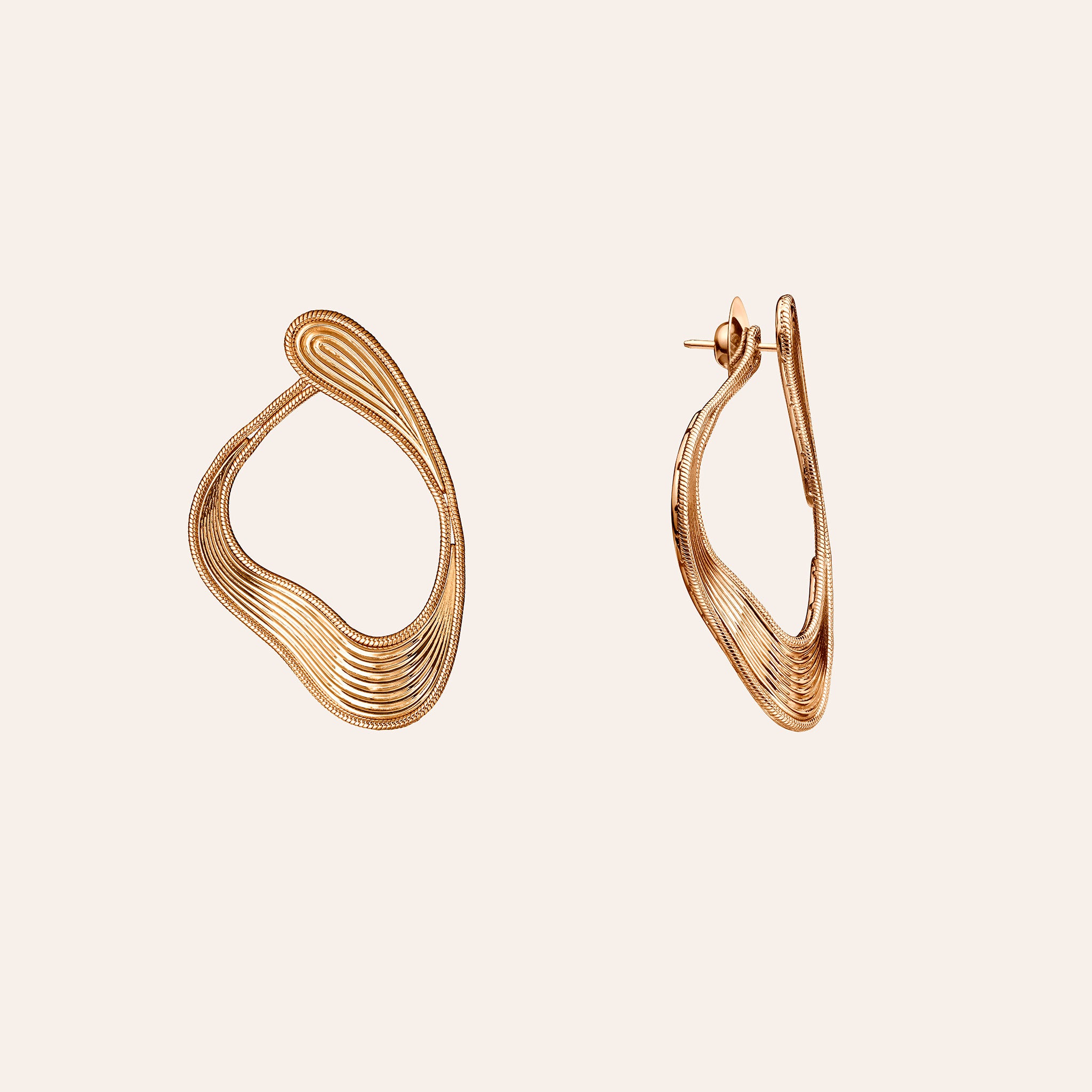 Fernando Jorge Stream Lines Medium Loop Earrings in 18K rose gold, sculptural line earrings that wrap from front to back