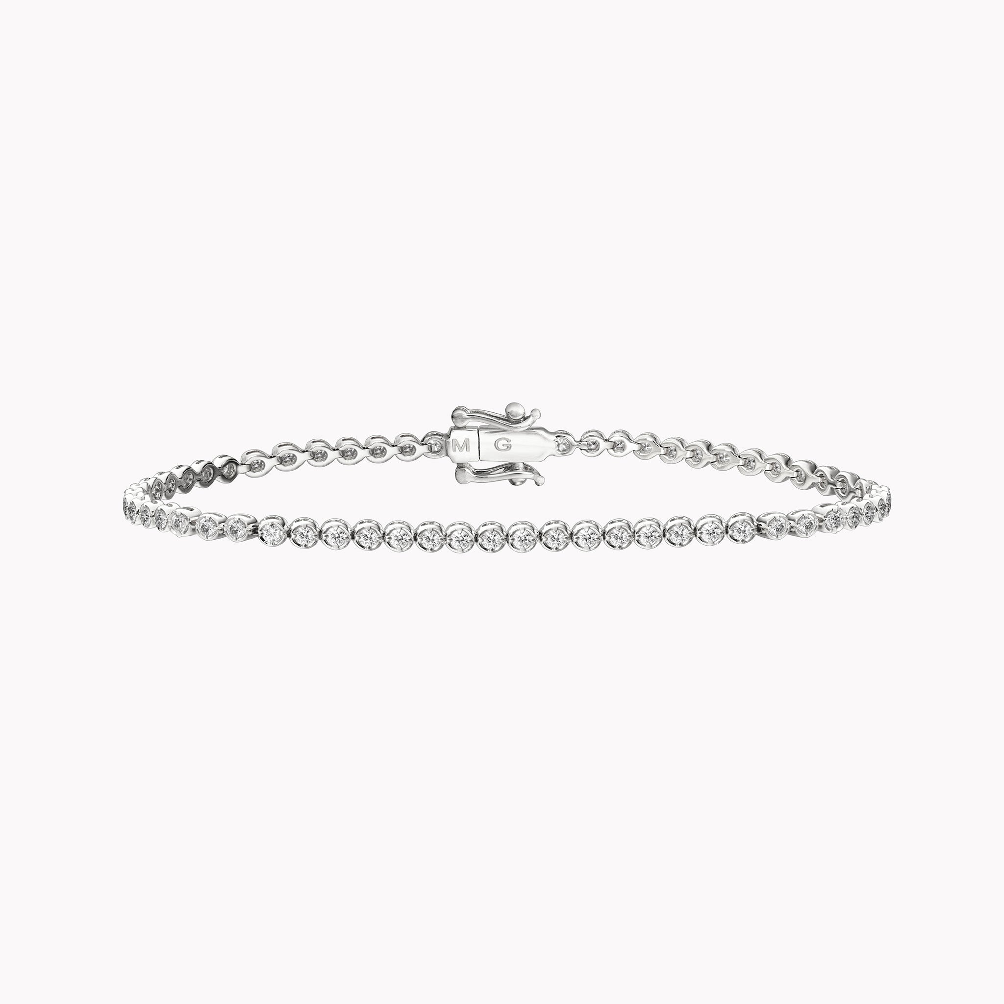 18K gold tennis bracelet featuring 1.50 ct total bezel-set diamonds linked in a continuous line around the wrist.