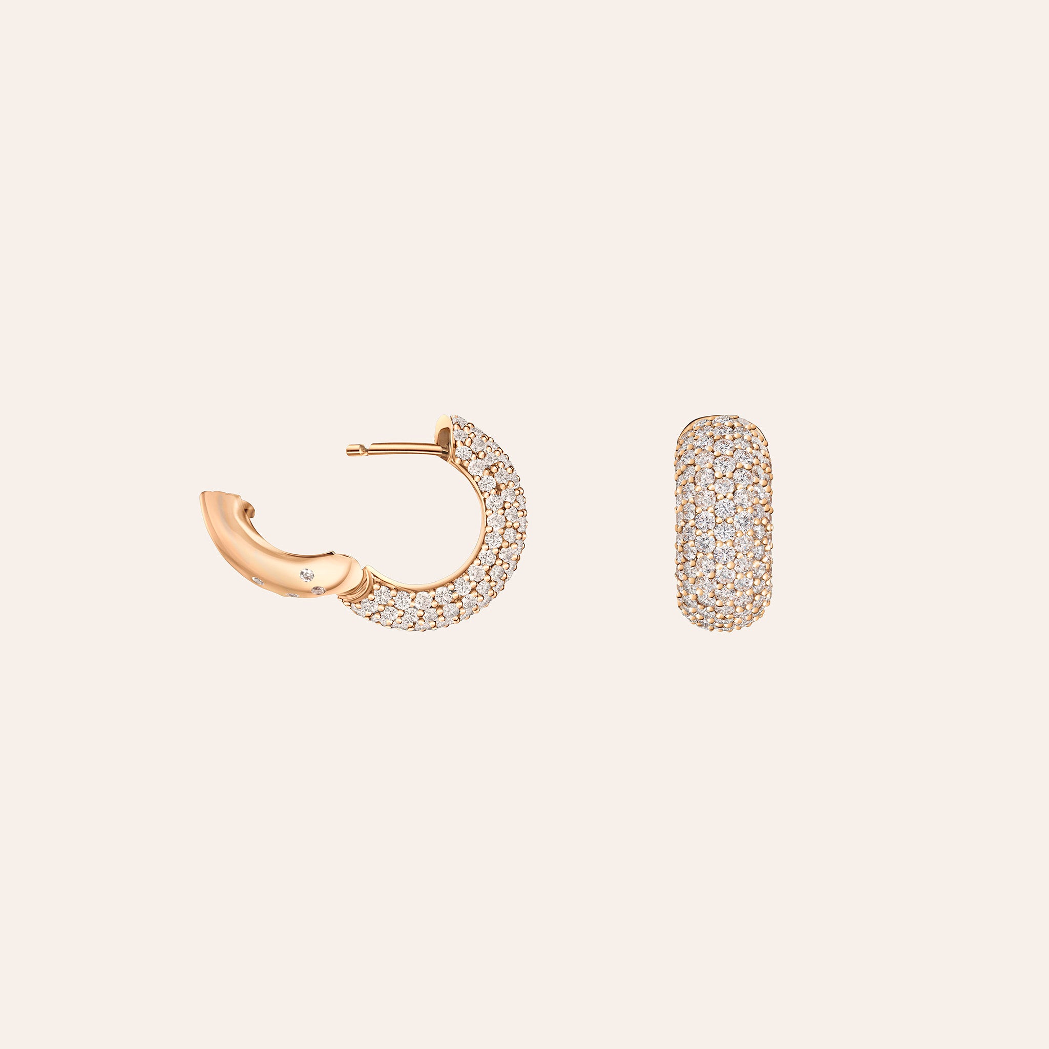 Side view of an 18K rose gold diamond pavé huggie earring showing the domed silhouette