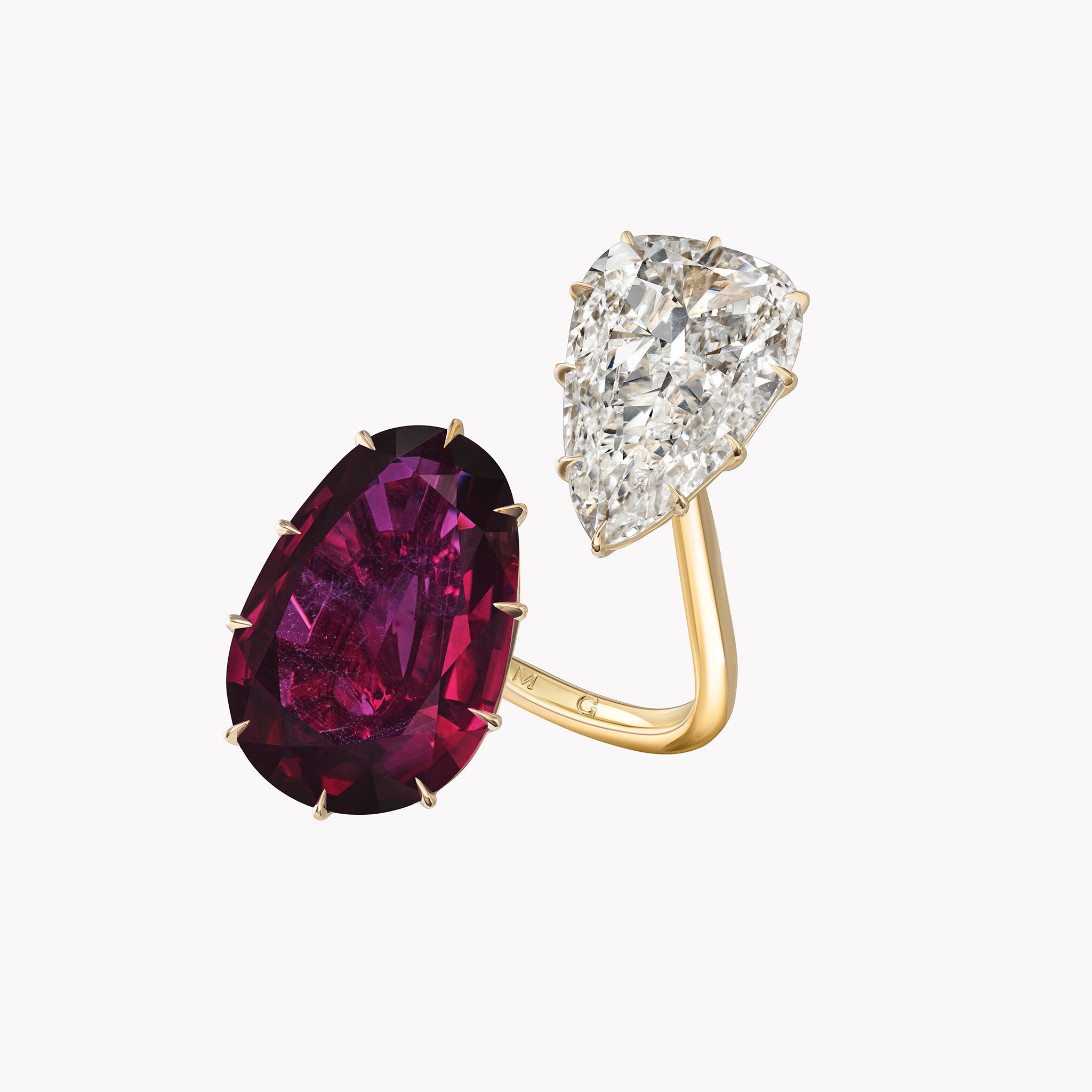 The Daphne Mozambique Ruby & Diamond Ring in 18K yellow gold with a 10.48-carat no-heat Mozambique ruby and 3.83-carat GIA-certified diamond.