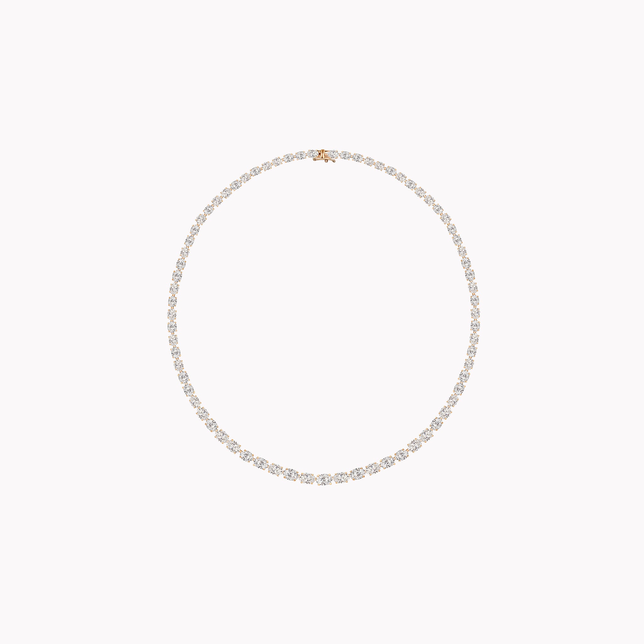 18K gold East-West oval diamond tennis necklace featuring 23.02ct of GIA-certified D–G SI1–VS2 diamonds in a continuous, modern line design.
