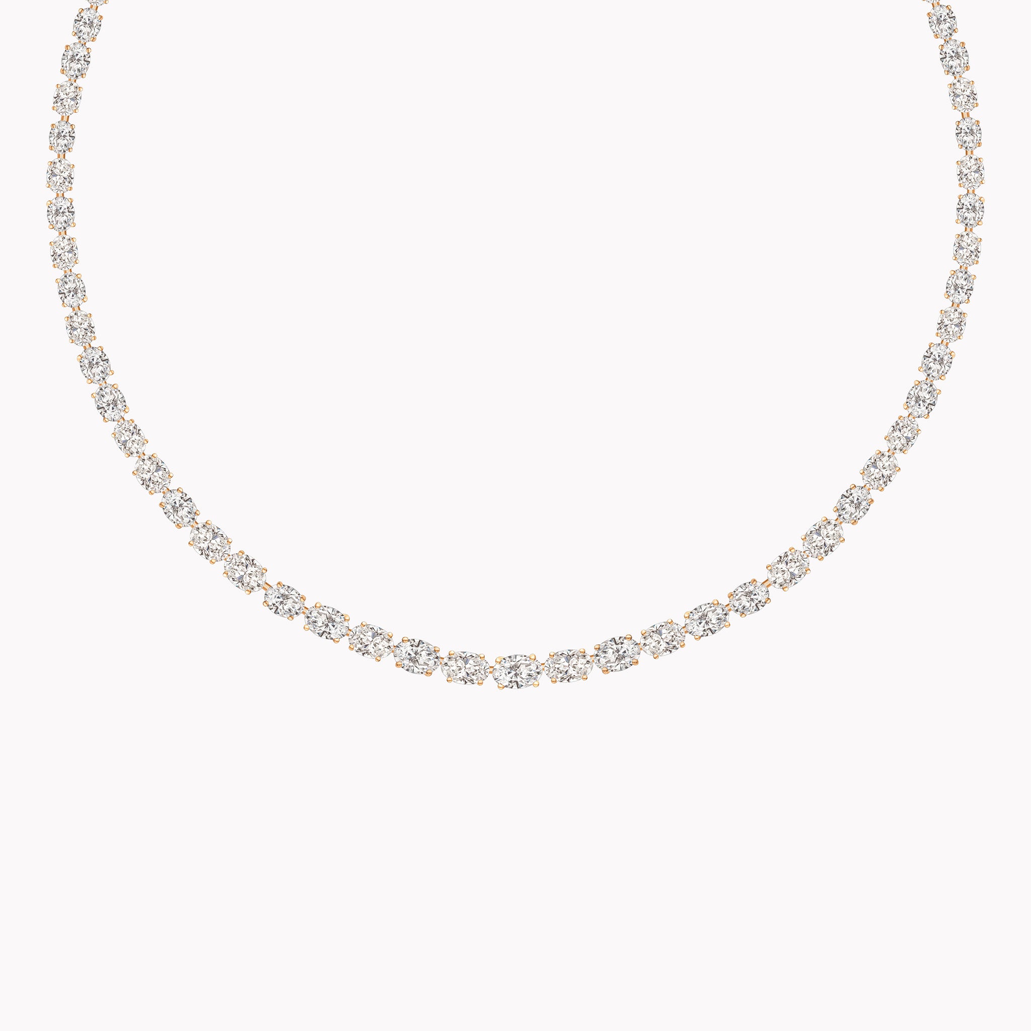 18K gold East-West oval diamond tennis necklace featuring 23.02ct of GIA-certified D–G SI1–VS2 diamonds in a continuous, modern line design.