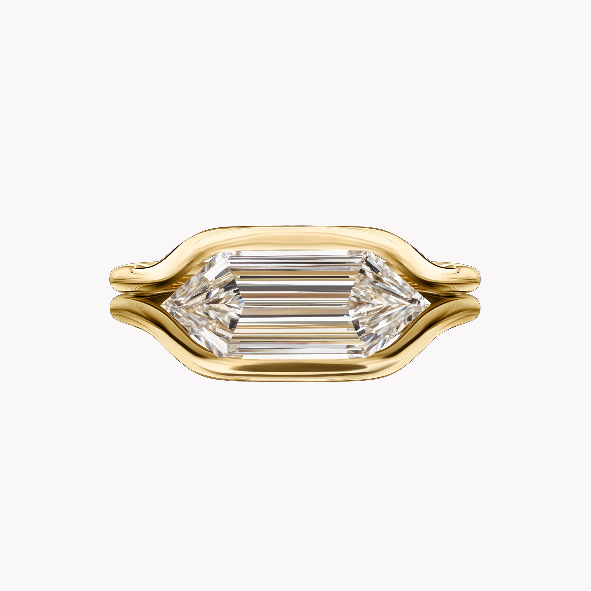 18-karat yellow gold Rêve Ring by Material Good featuring a 2.01-carat east-west hexagonal diamond in a bezel-style double-shank setting, front view and three-quarter view.
