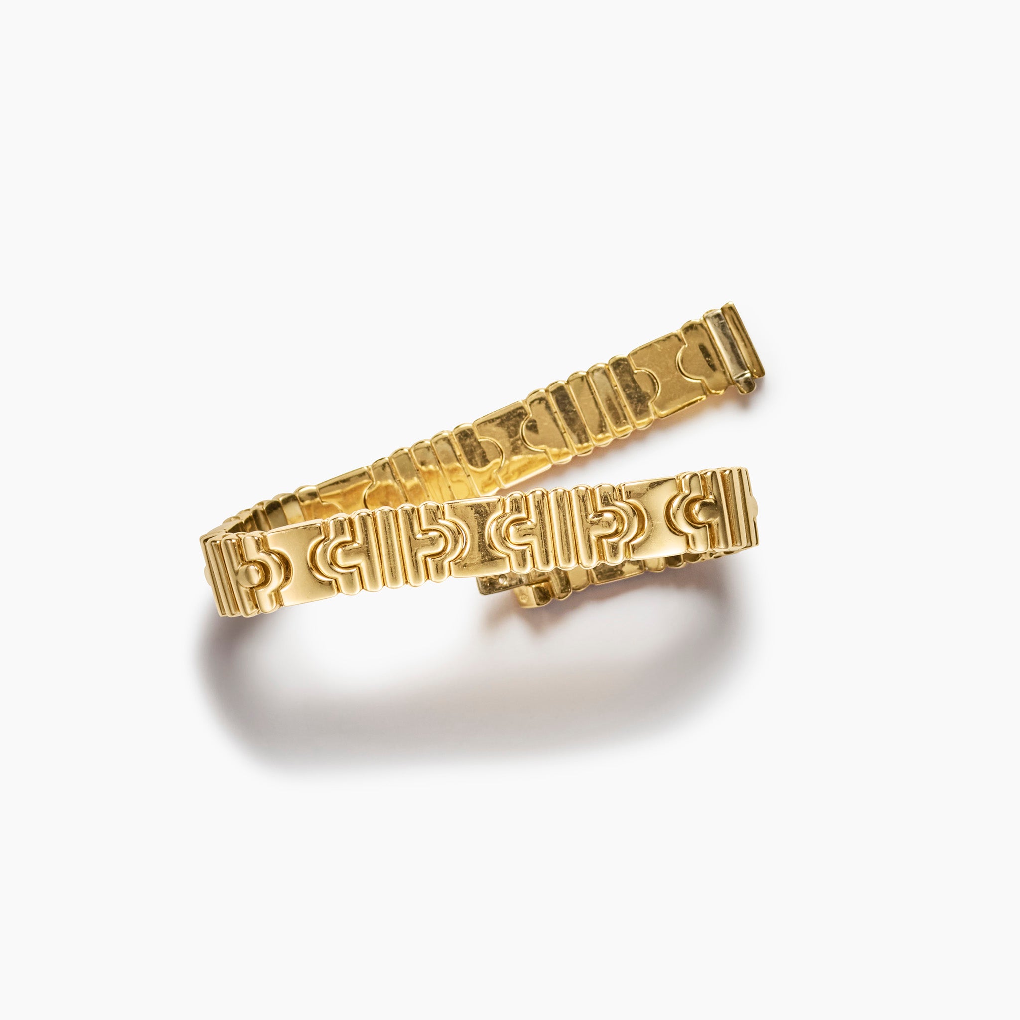 Signed vintage Bulgari Parentesi 18K yellow gold bracelet with raised interlocking architectural links
