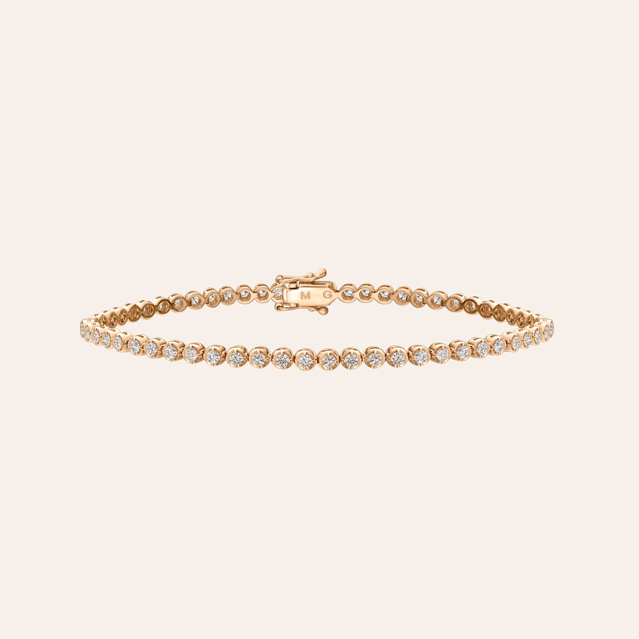 18K rose gold tennis bracelet featuring 1.50 ct total bezel-set diamonds linked in a continuous line around the wrist.