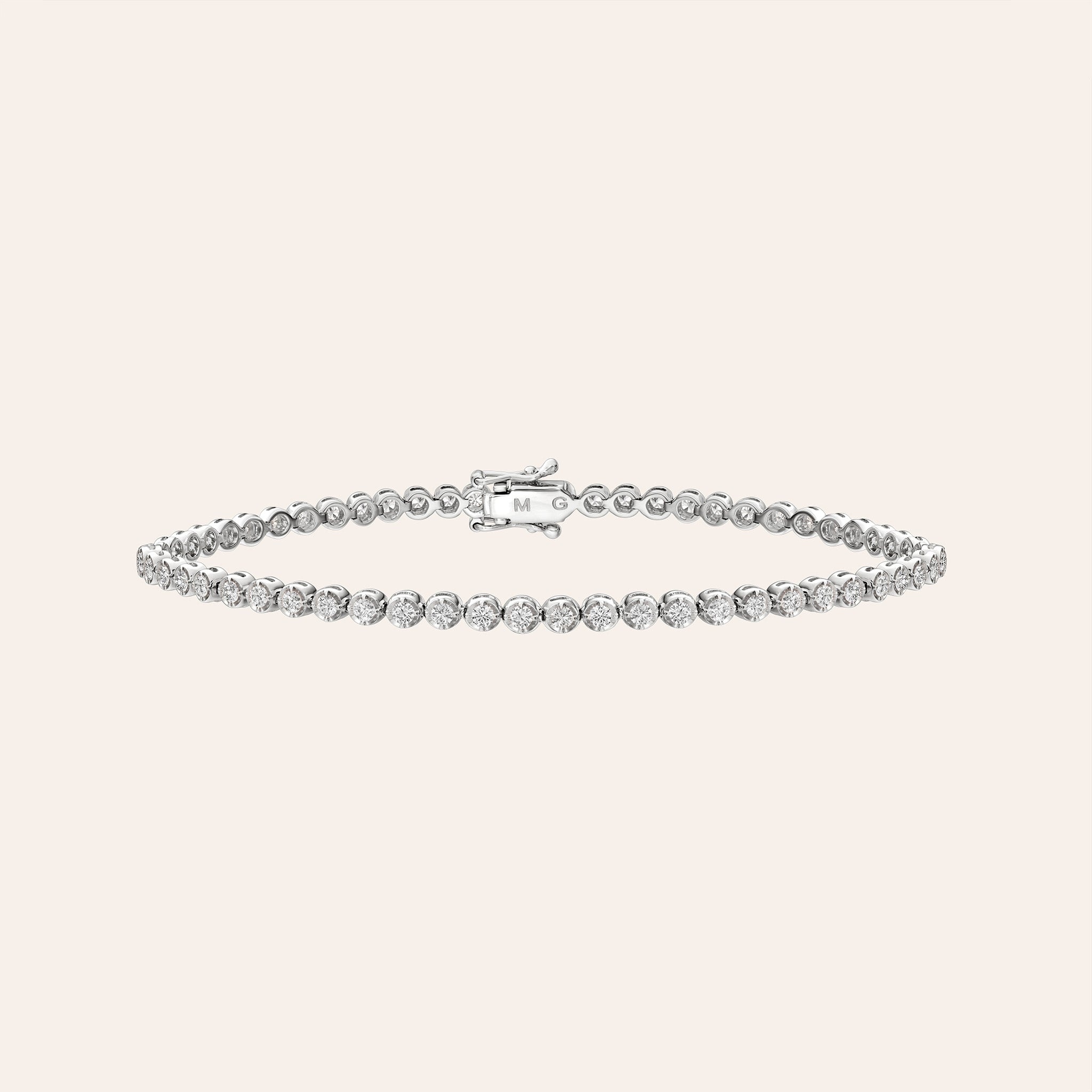 18K white gold tennis bracelet featuring 1.50 ct total bezel-set diamonds linked in a continuous line around the wrist.