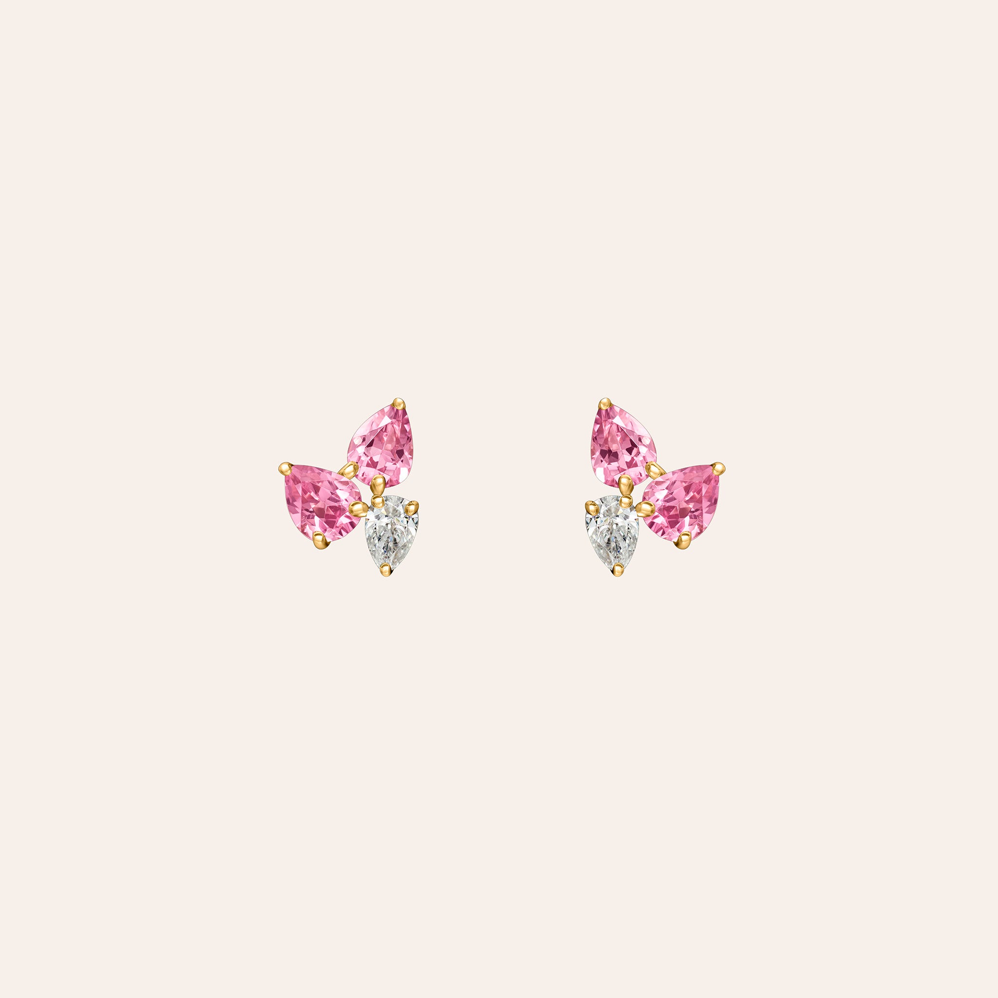 18K yellow, white or rose gold stud earrings featuring 1.09 ct pear-shaped pink tourmalines and 0.26 ct pear-shaped diamonds in a delicate cluster design