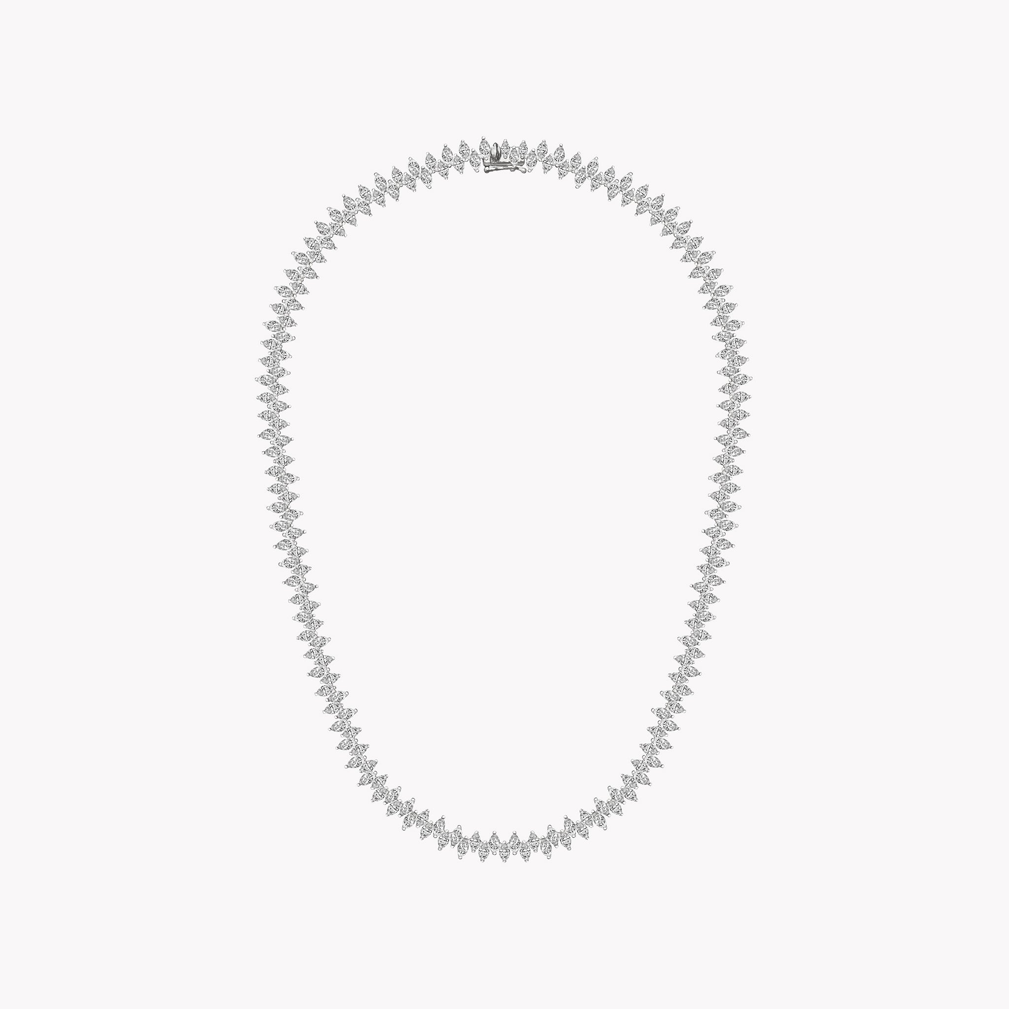 Marquise Diamond White gold necklace on a light coral background