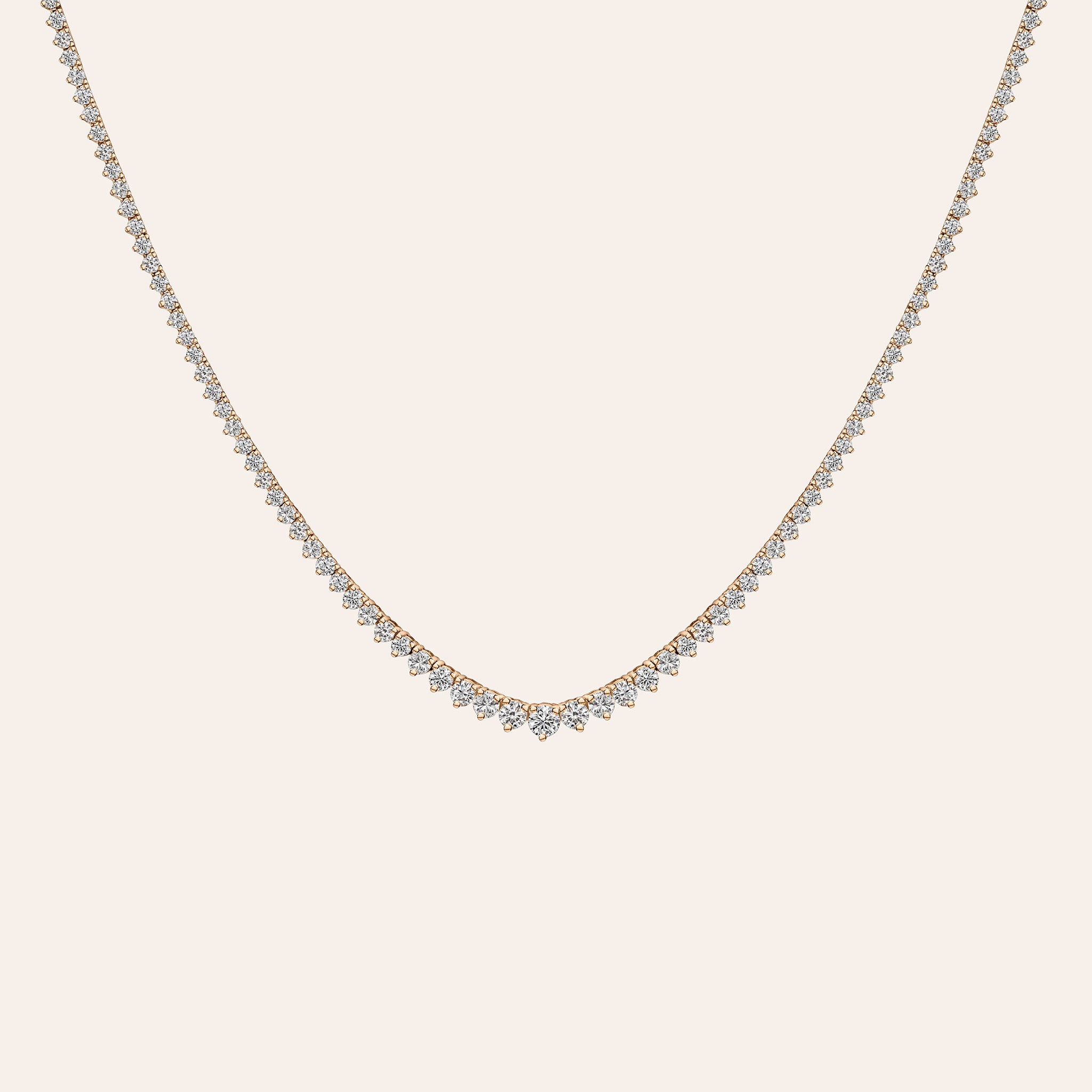 Medium Graduated Tennis Necklace in 18k rose gold with round brilliant diamonds graduating toward the center
