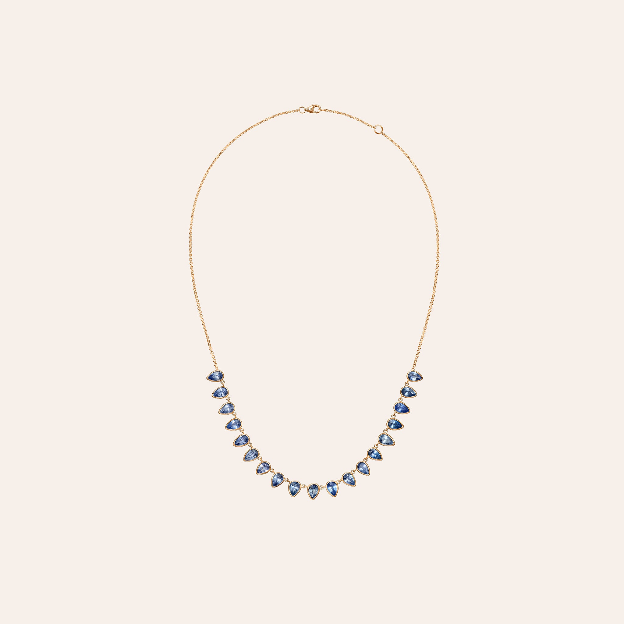 9.25 carats of pear-shaped icy blue sapphires set in 14K rose gold.