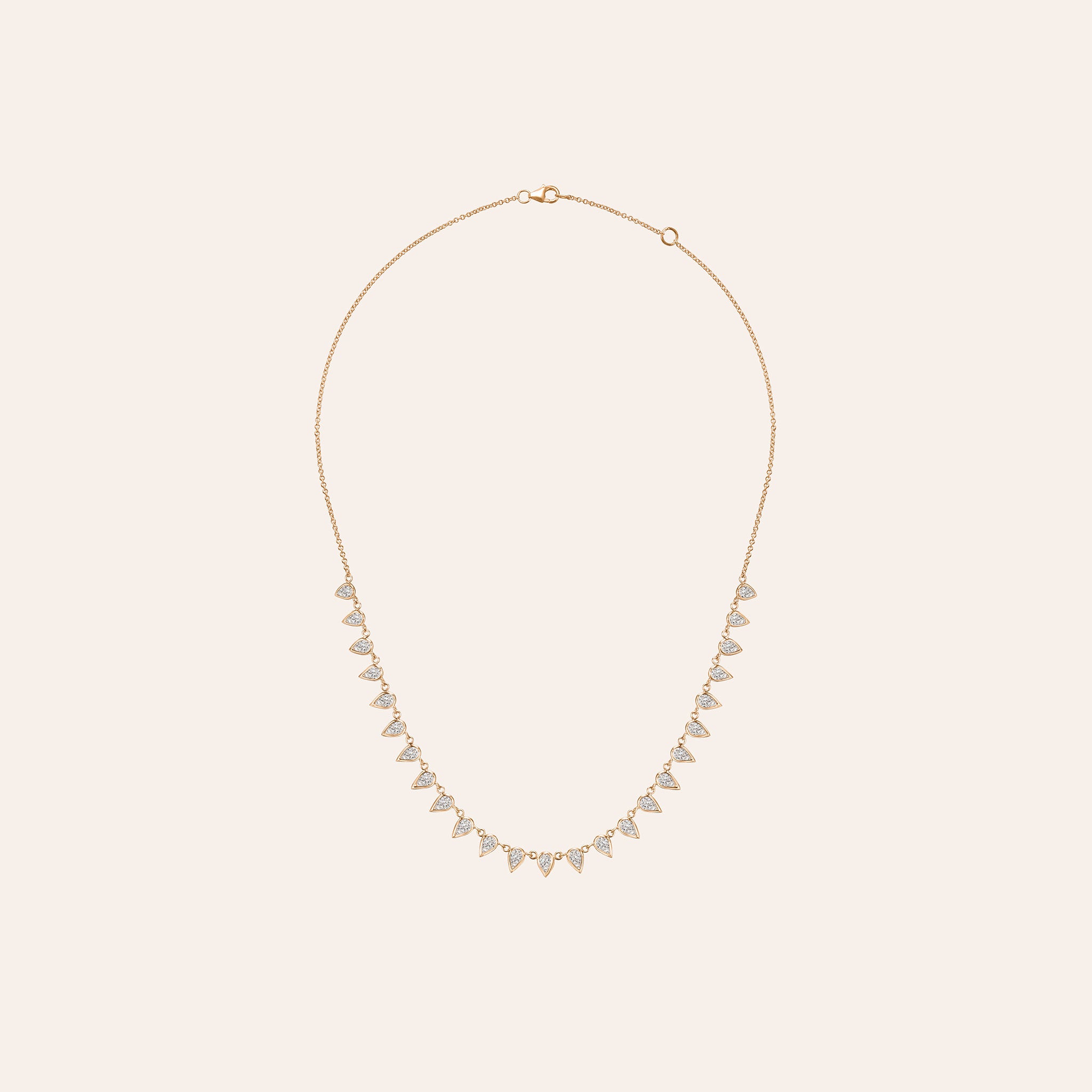 18K yellow, white and rose gold necklace featuring approximately 3.75 ct of G/H color, VS-SI clarity pear-shaped diamonds in a fringe design.