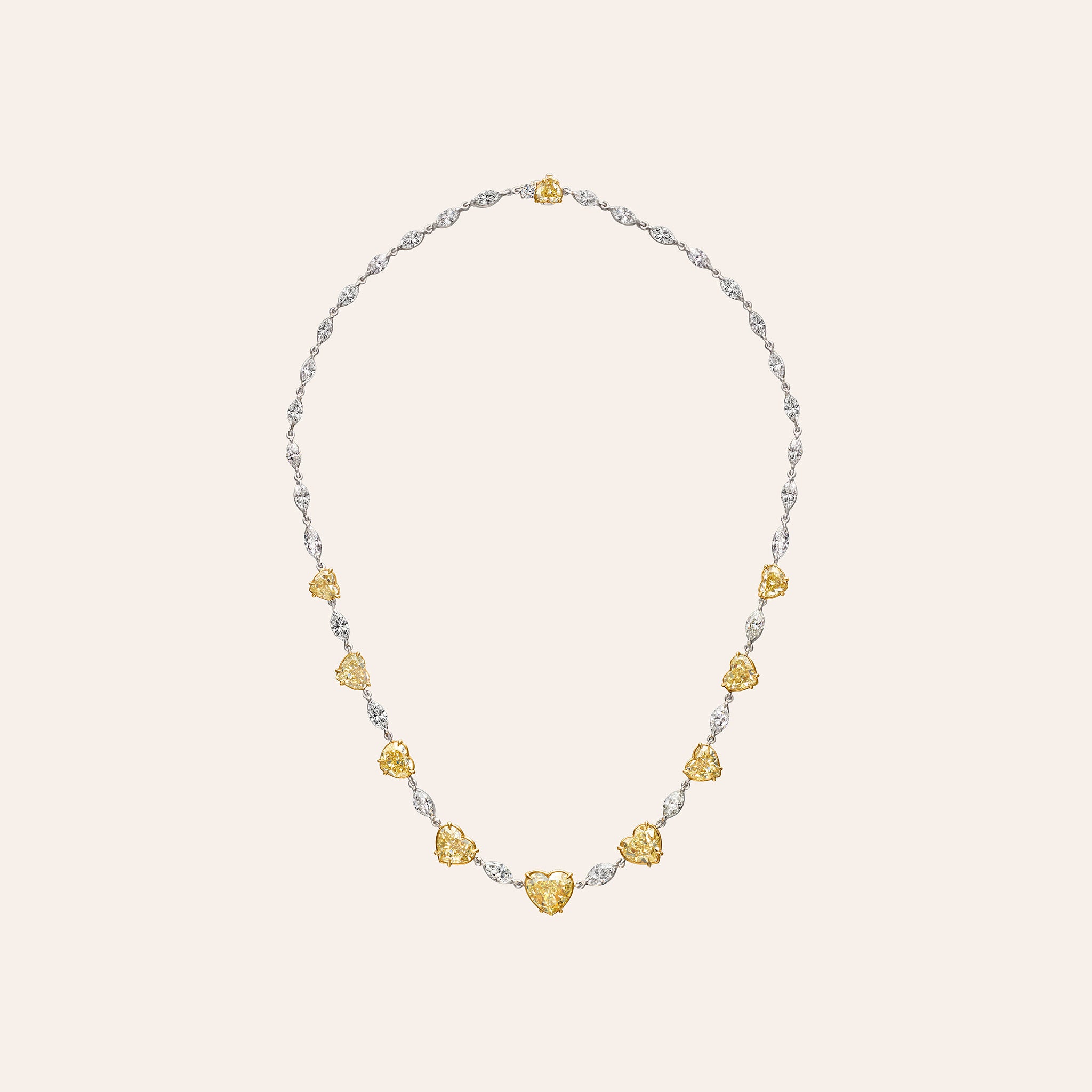 Fancy Yellow Heart and Marquise Diamond Necklace with 16.30 ct of yellow heart diamonds and marquise diamonds in 18k gold
