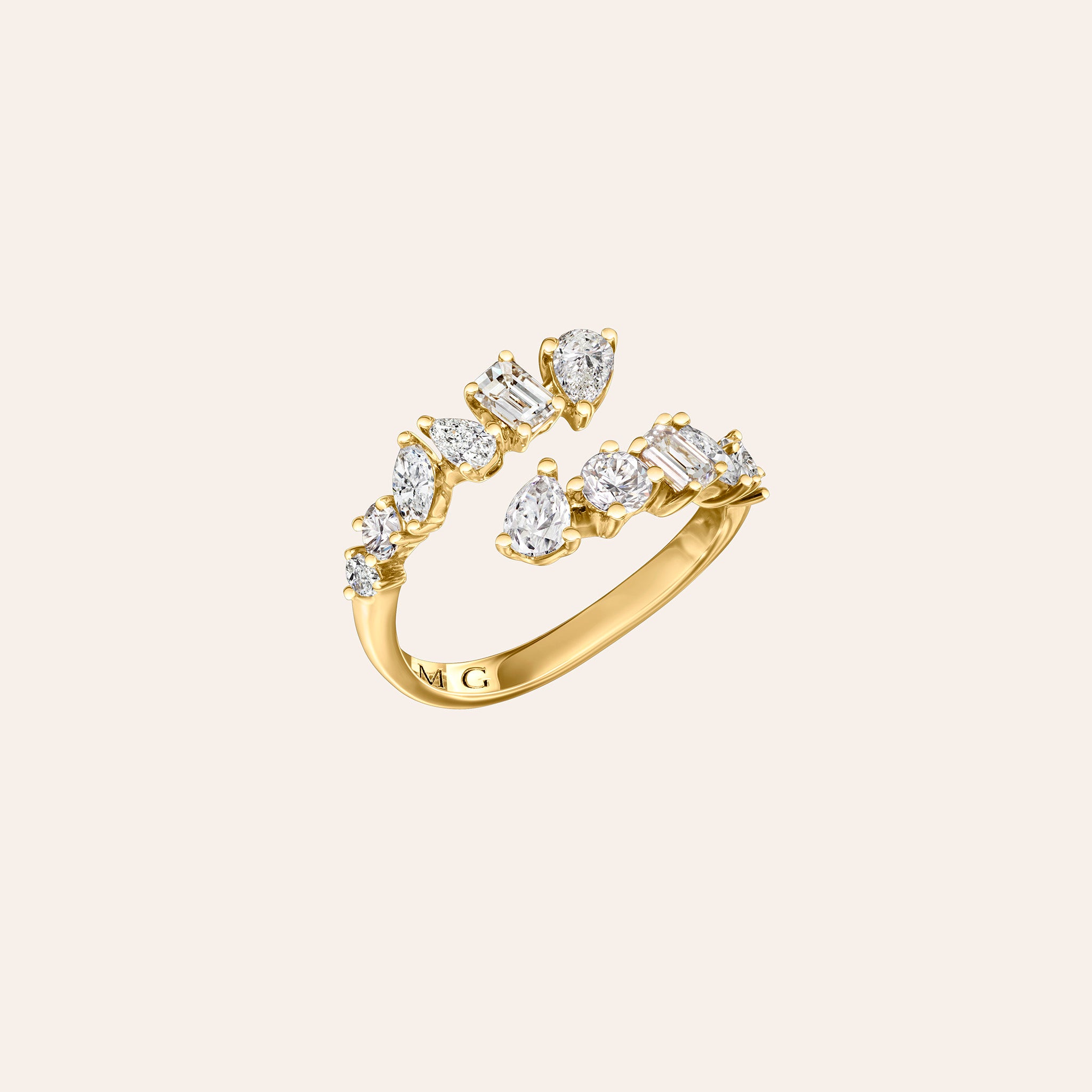 White Gold multishape diamond ring on a cream background side angle