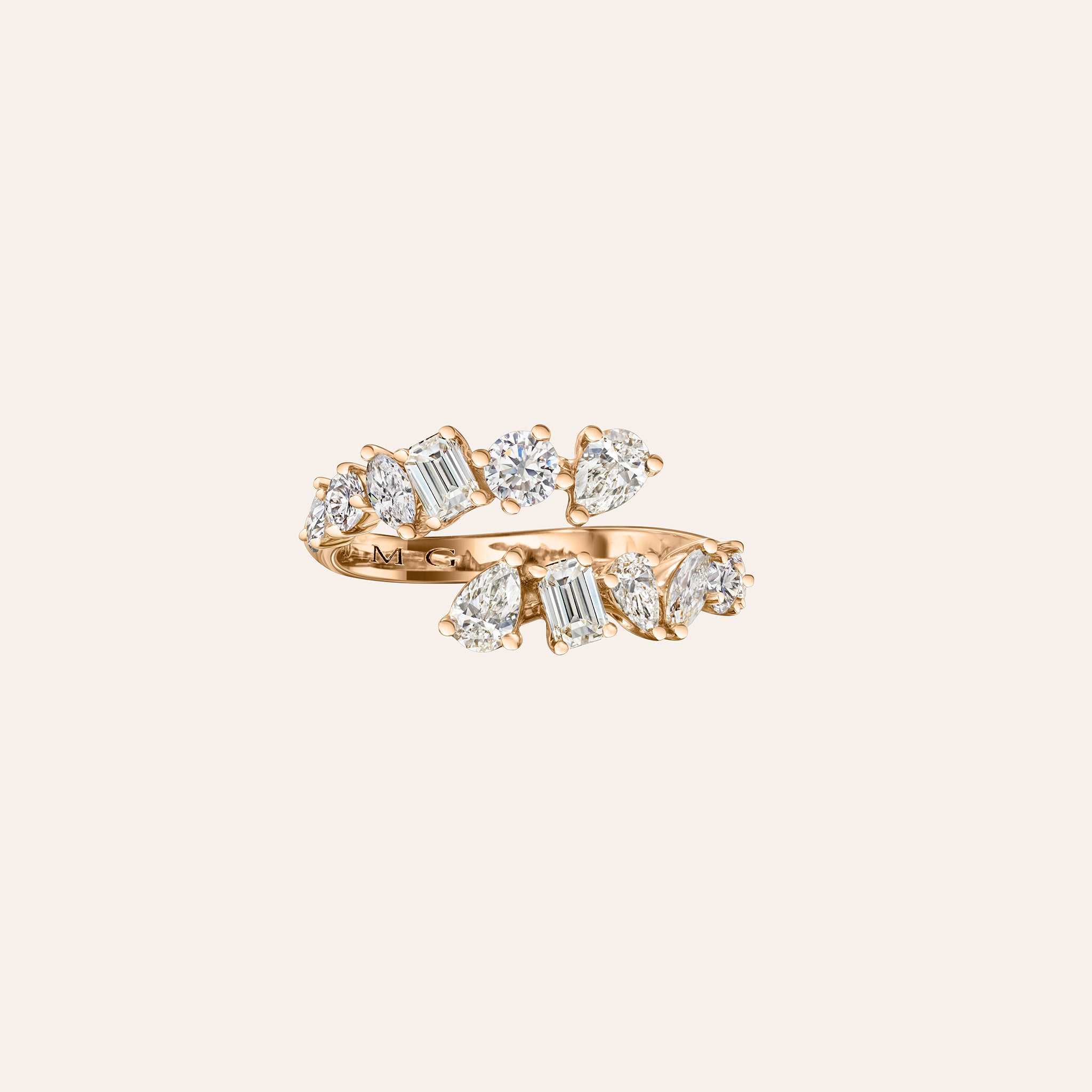 Rose Gold multishape diamond ring on a cream background