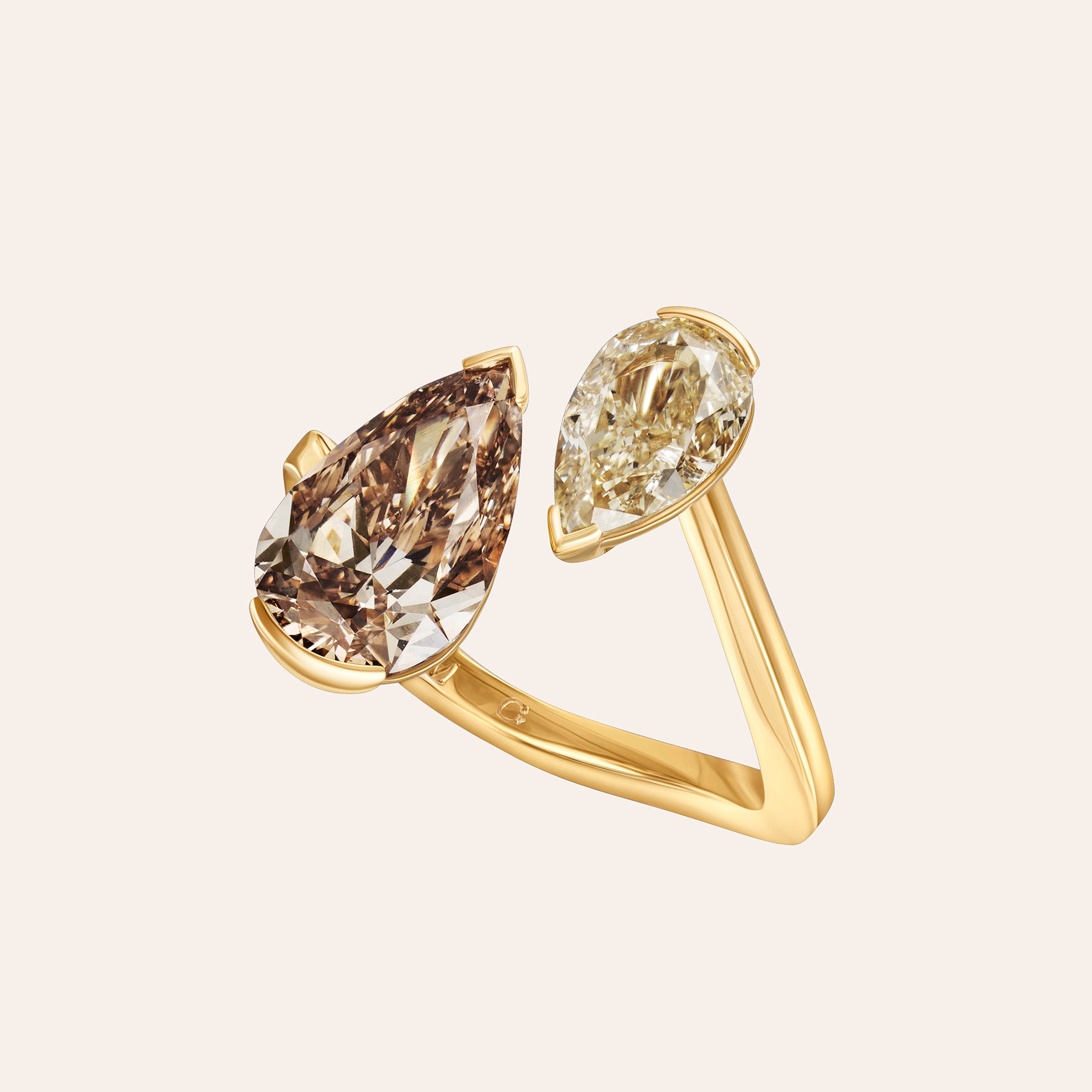 18K yellow gold Daphne Mocha Diamond Duo ring featuring 2.07 carats of fancy orange-brown and 1.02 carats of fancy light brown pear-shaped diamonds
