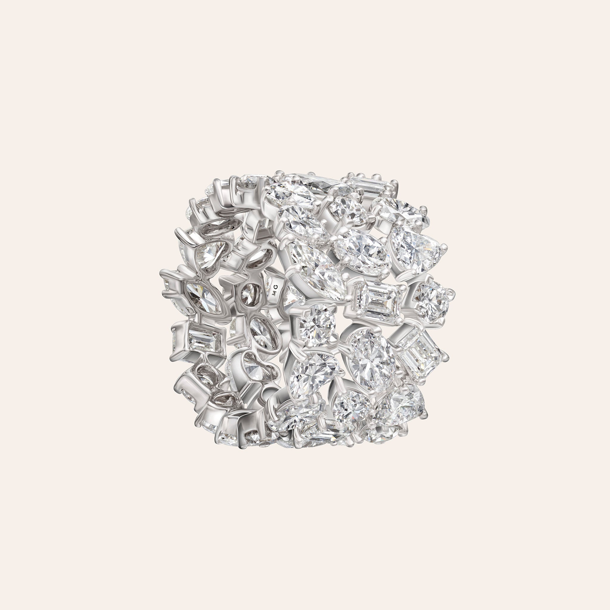 18K white gold three-row eternity band with 11.42ct of mixed diamond shapes arranged in an open, sculptural design.