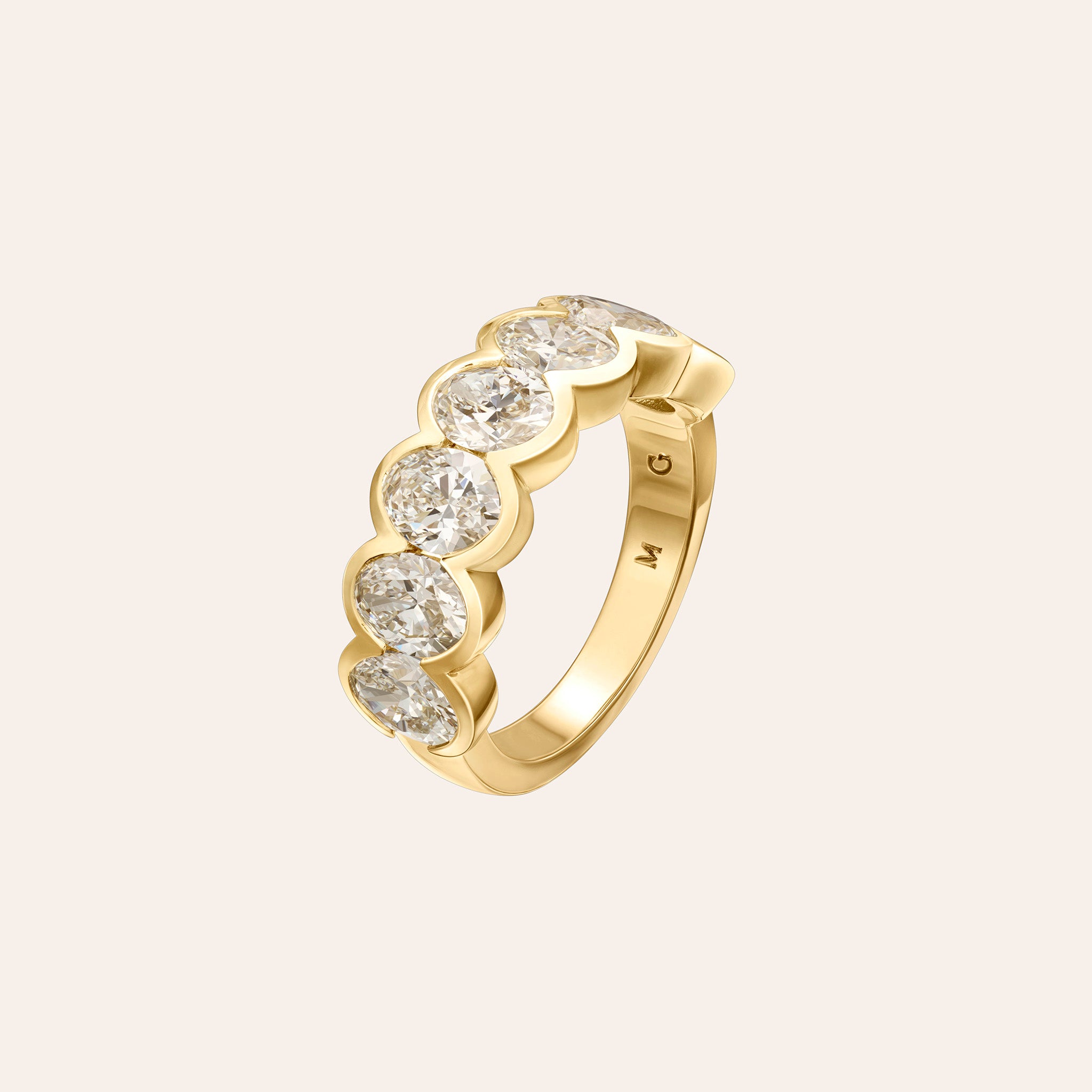 Large Alexa Oval Half Band in 18K yellow gold with 3.60 carats of bezel-set oval diamonds