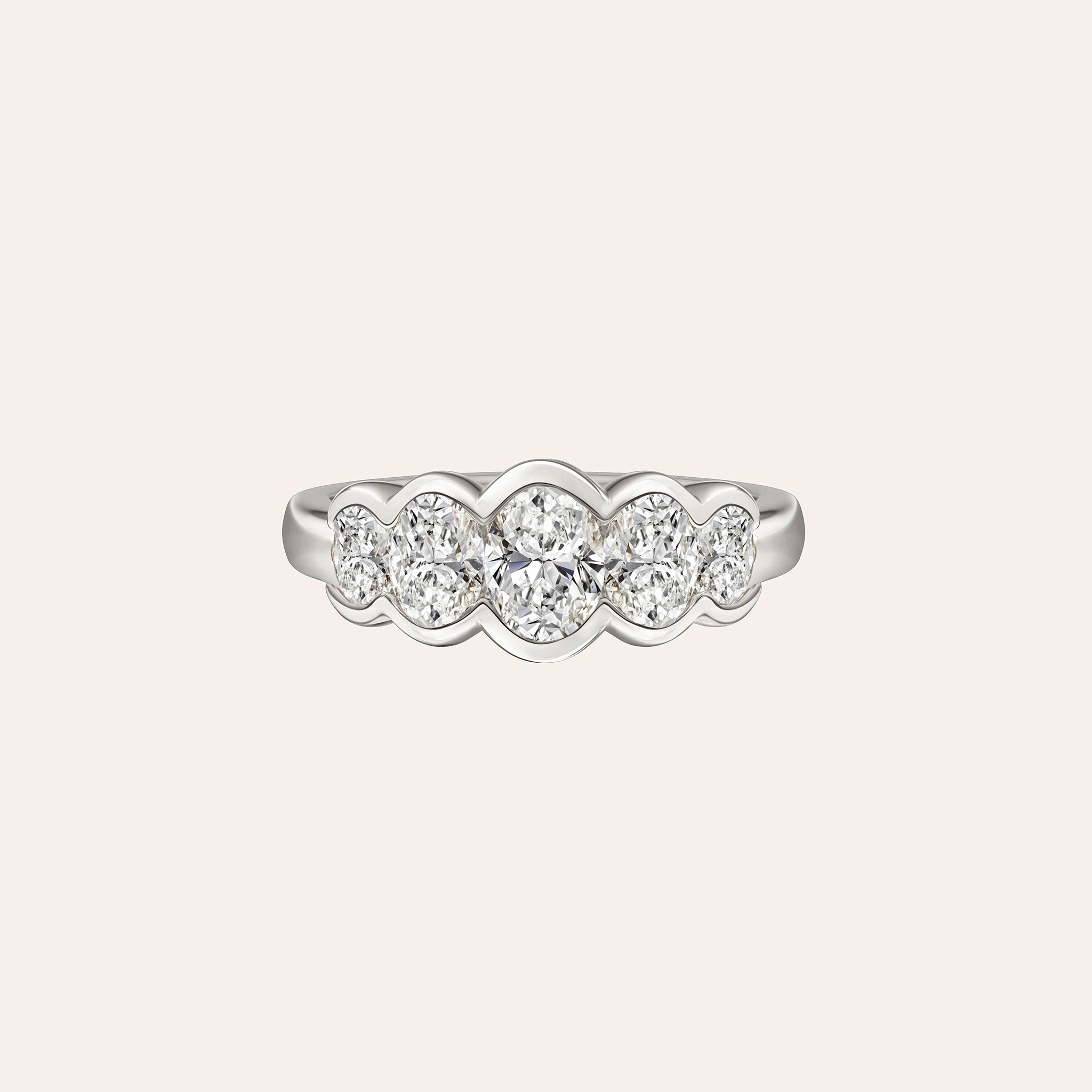 18K White gold half-band ring featuring five bezel-set oval-cut diamonds, totaling 1.00 ct, in a graduated design