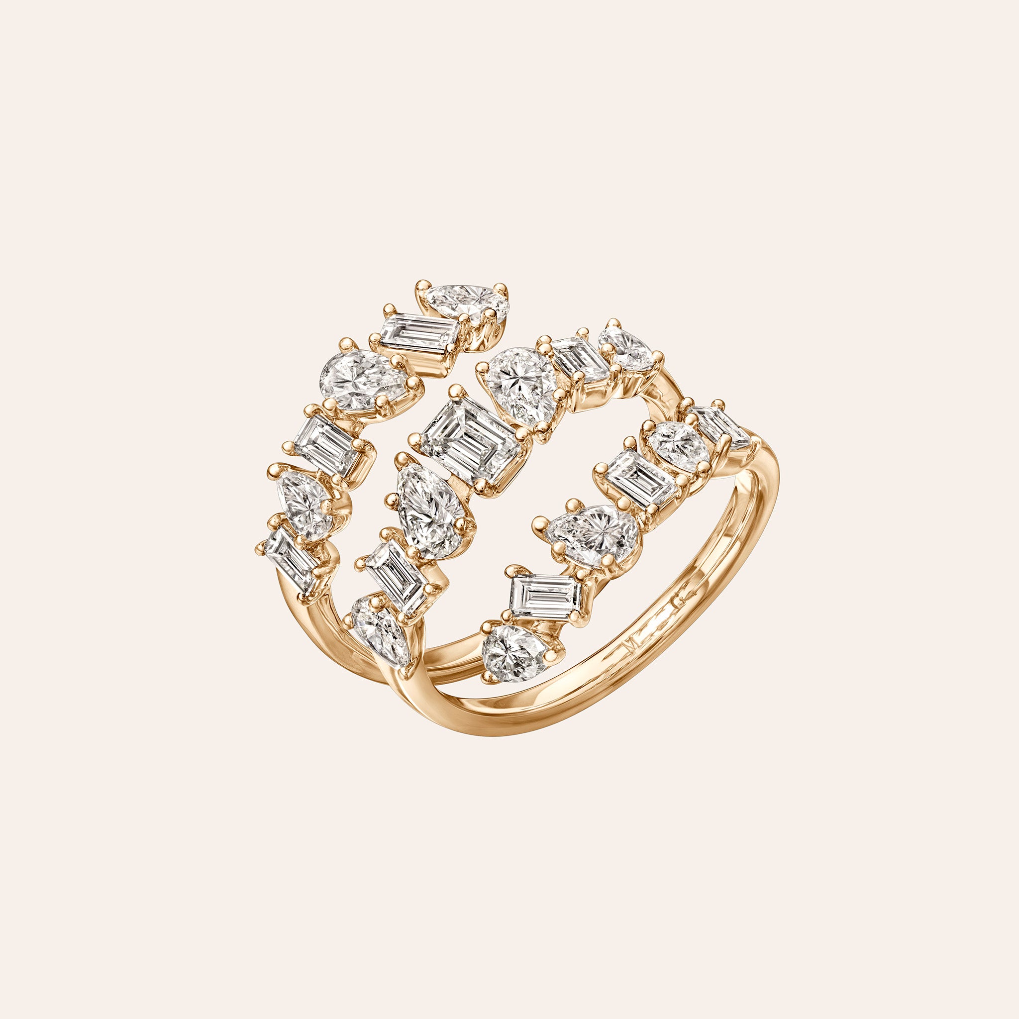 Emerald & Pear Shape Diamond Spiral Ring in 18K rose gold featuring 2.30 carats of G/H color, VS-SI clarity diamonds.