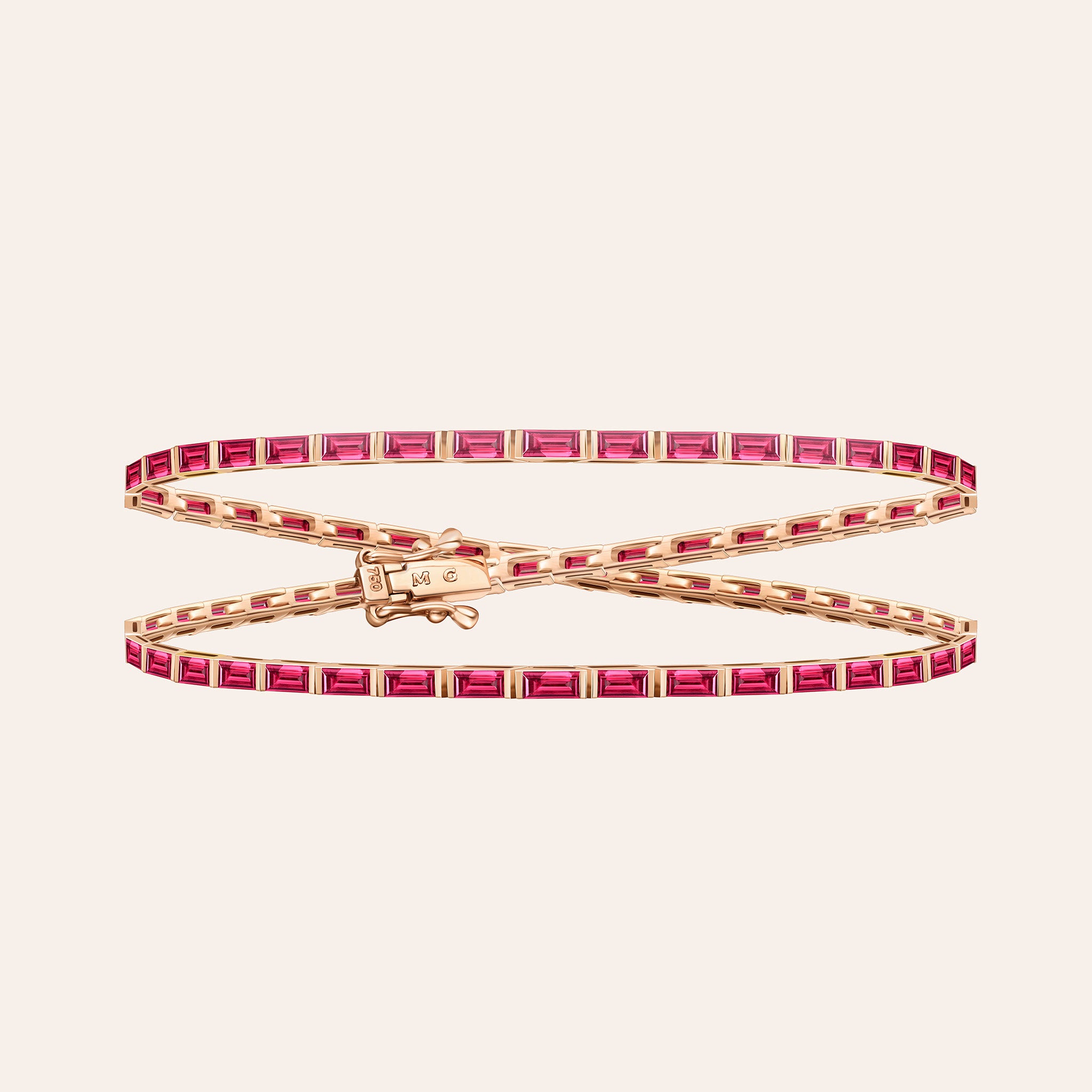 The Maia Ruby Wrap in 18k rose gold, a long wrap bracelet set with 5.60 ct of baguette rubies
