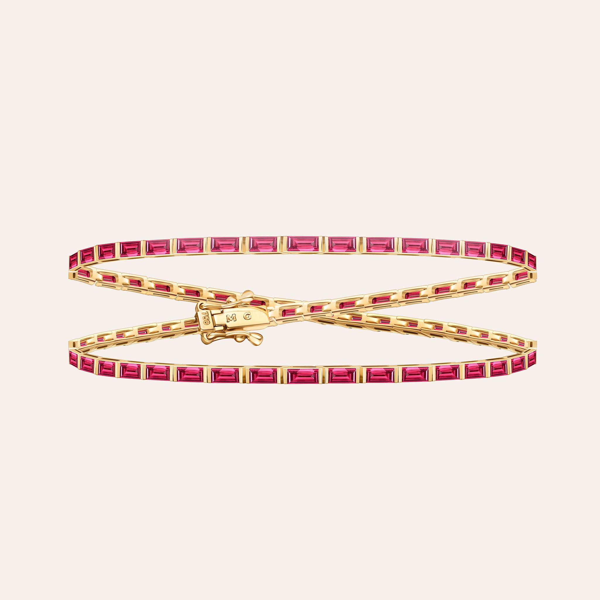 The Maia Ruby Wrap in 18k yellow gold, a long wrap bracelet set with 5.60 ct of baguette rubies
