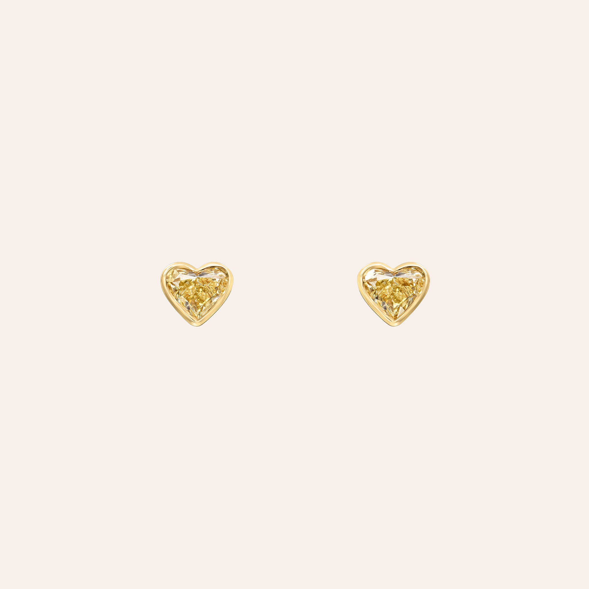 Fancy Yellow Heart Shape Diamond Studs