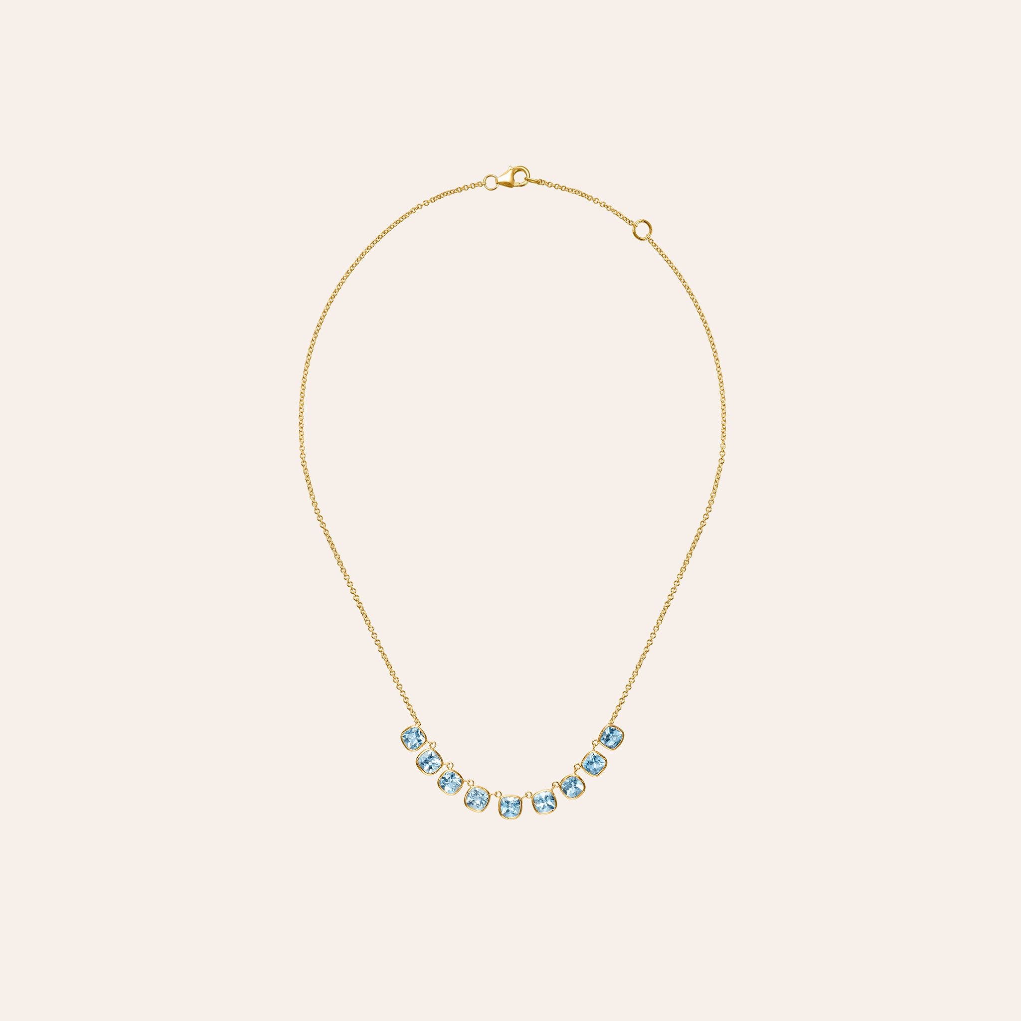 9.25 carats of pear-shaped icy blue aquamarine set in 14K  rose gold and 18k yellow gold