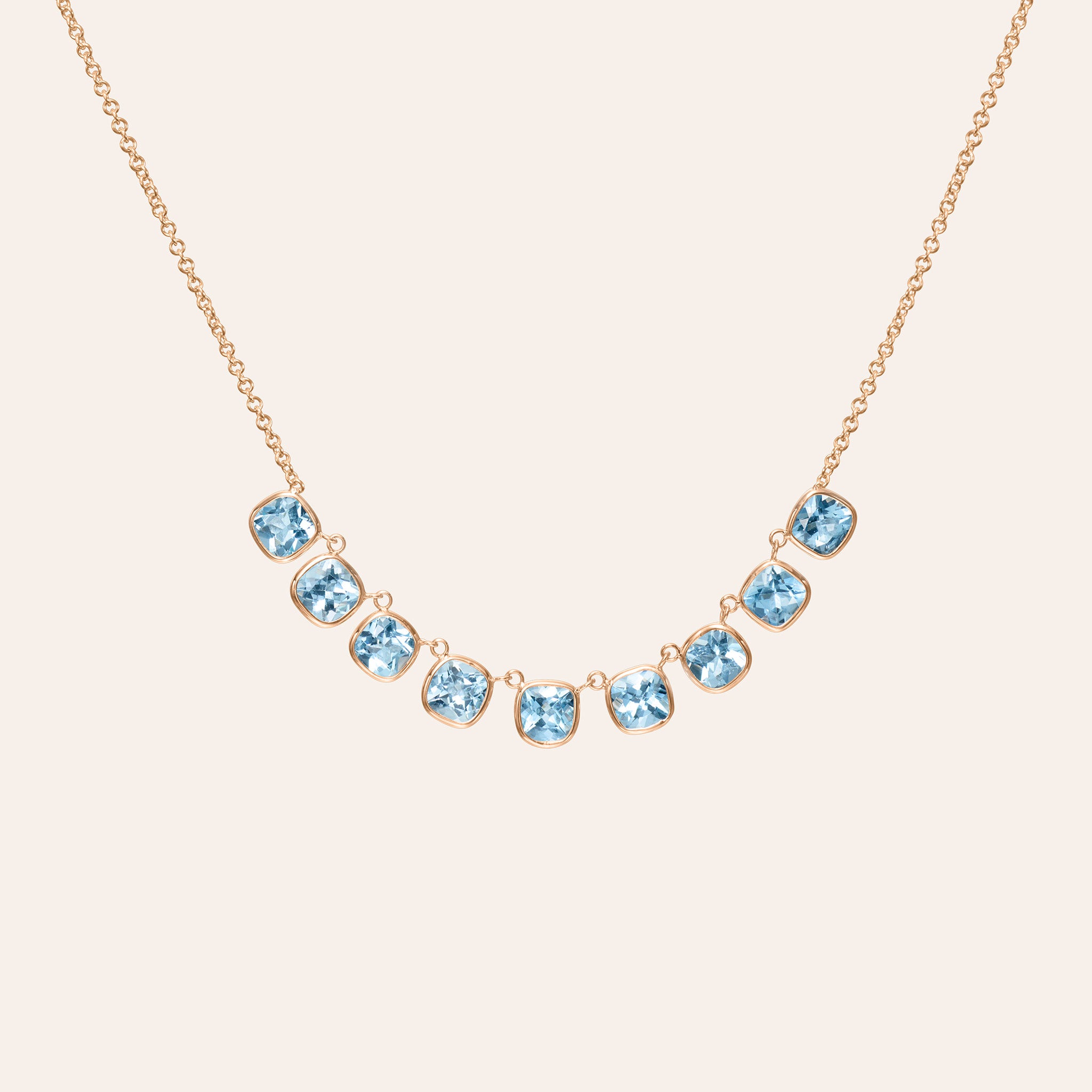 9.25 carats of pear-shaped icy blue aquamarine set in 14K  rose gold and 18k yellow gold