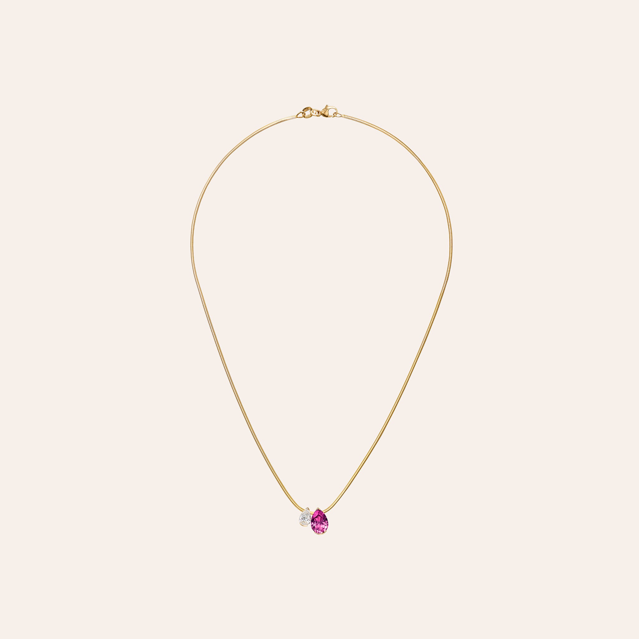 18K yellow gold MG Muse Duo Pendant featuring a 2.00-carat pear-shaped pink sapphire and a 0.70-carat pear-shaped diamond on a 16-inch snake chain