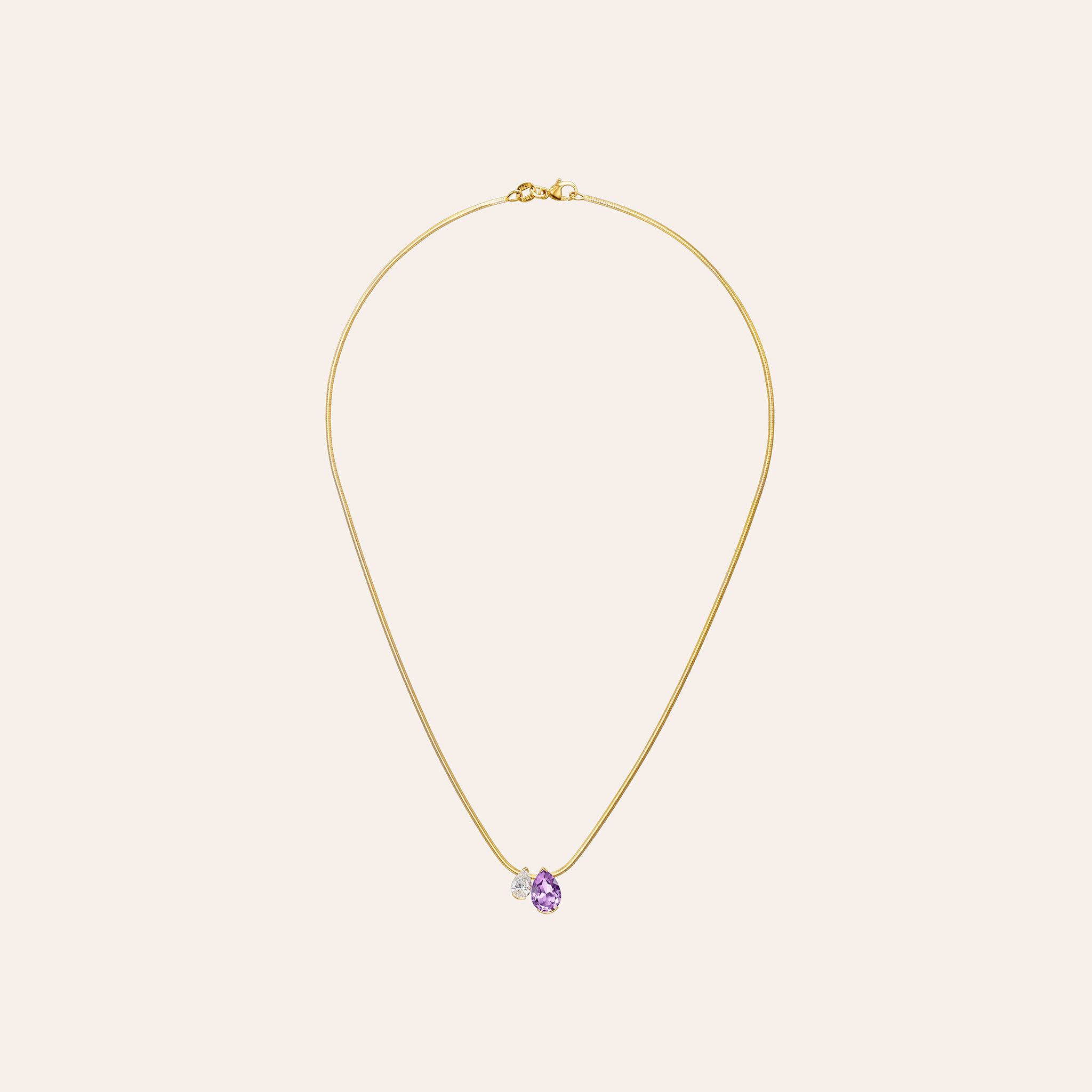 The Amethyst Muse Duo Pendant with a 2.00 ct pear amethyst and 0.70 ct pear diamond in 18k yellow gold
