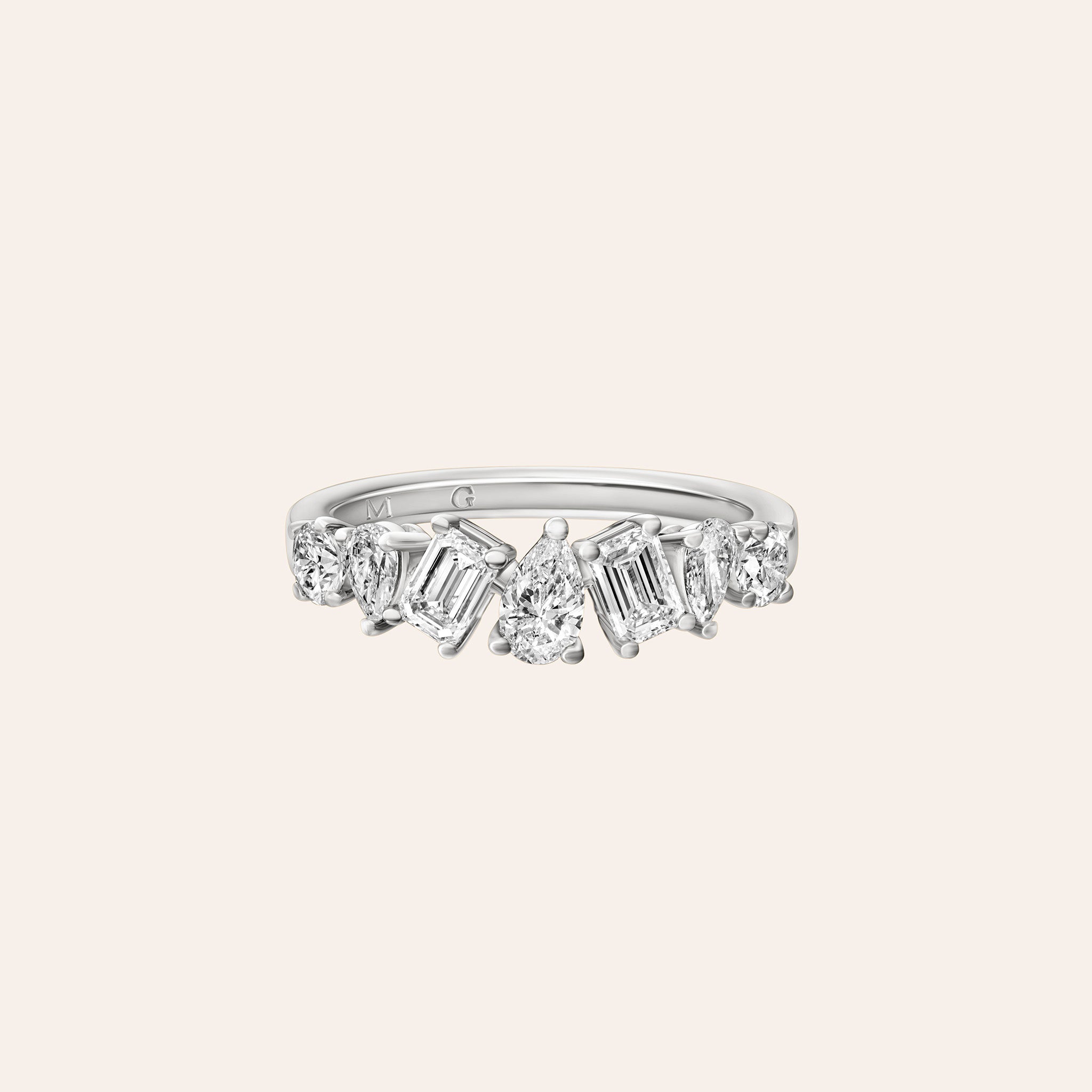 Small Multi-Shape Half Band in 18k white gold with seven mixed-cut diamonds set halfway around the band

