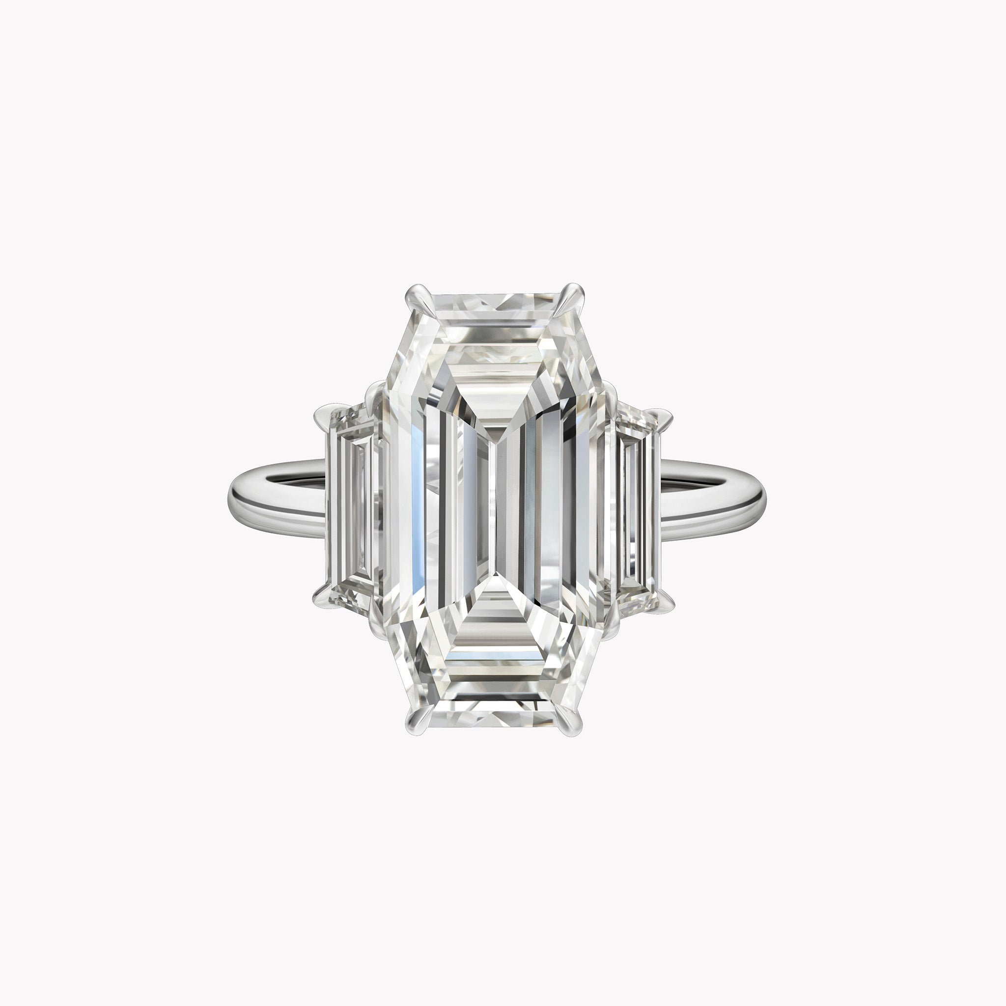 Elongated Emerald Cut Engagement Ring with Trapezoid Side Stones