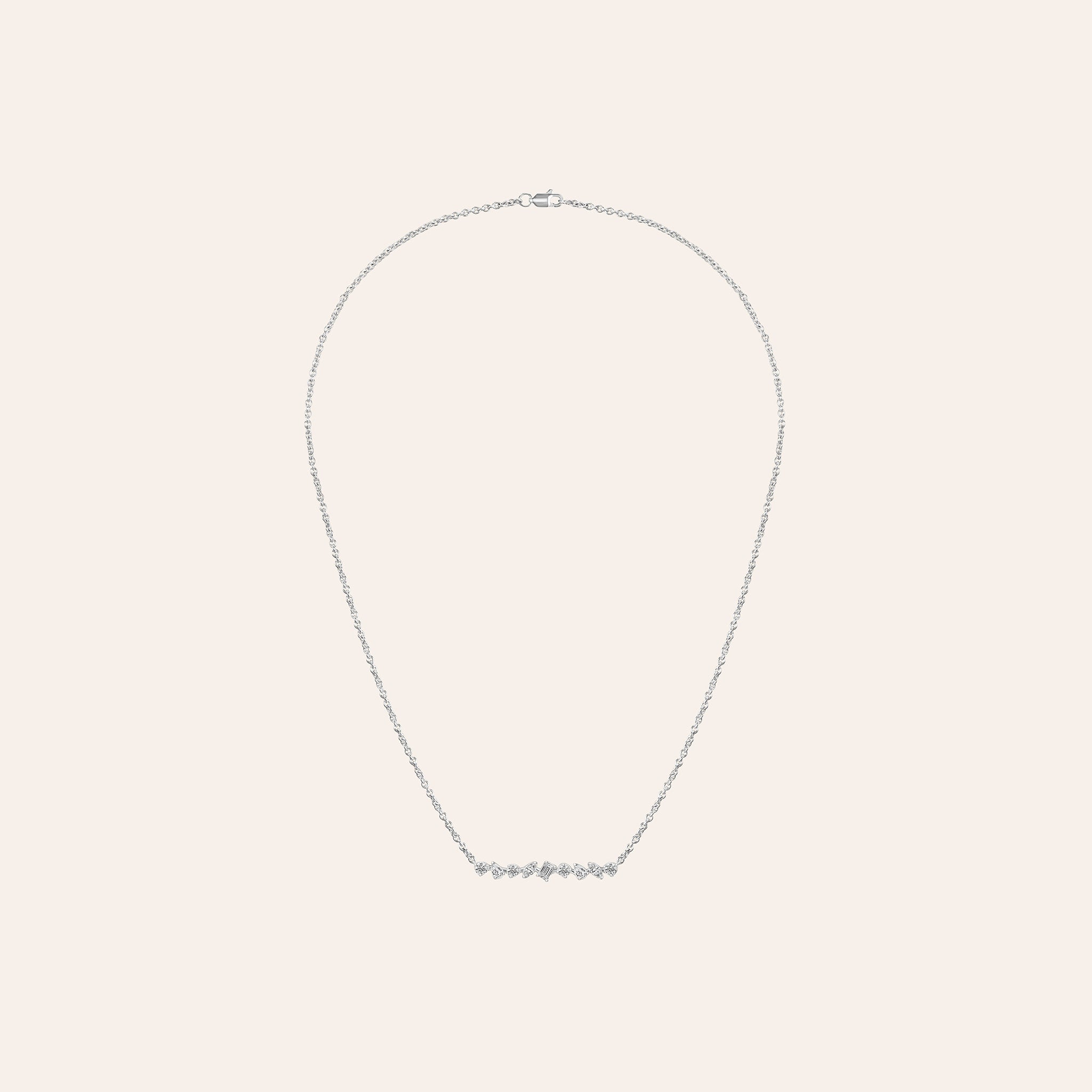 Multi-Shape Bar Pendant in 18k white gold with round, pear, marquise, and baguette diamonds on an adjustable chain
