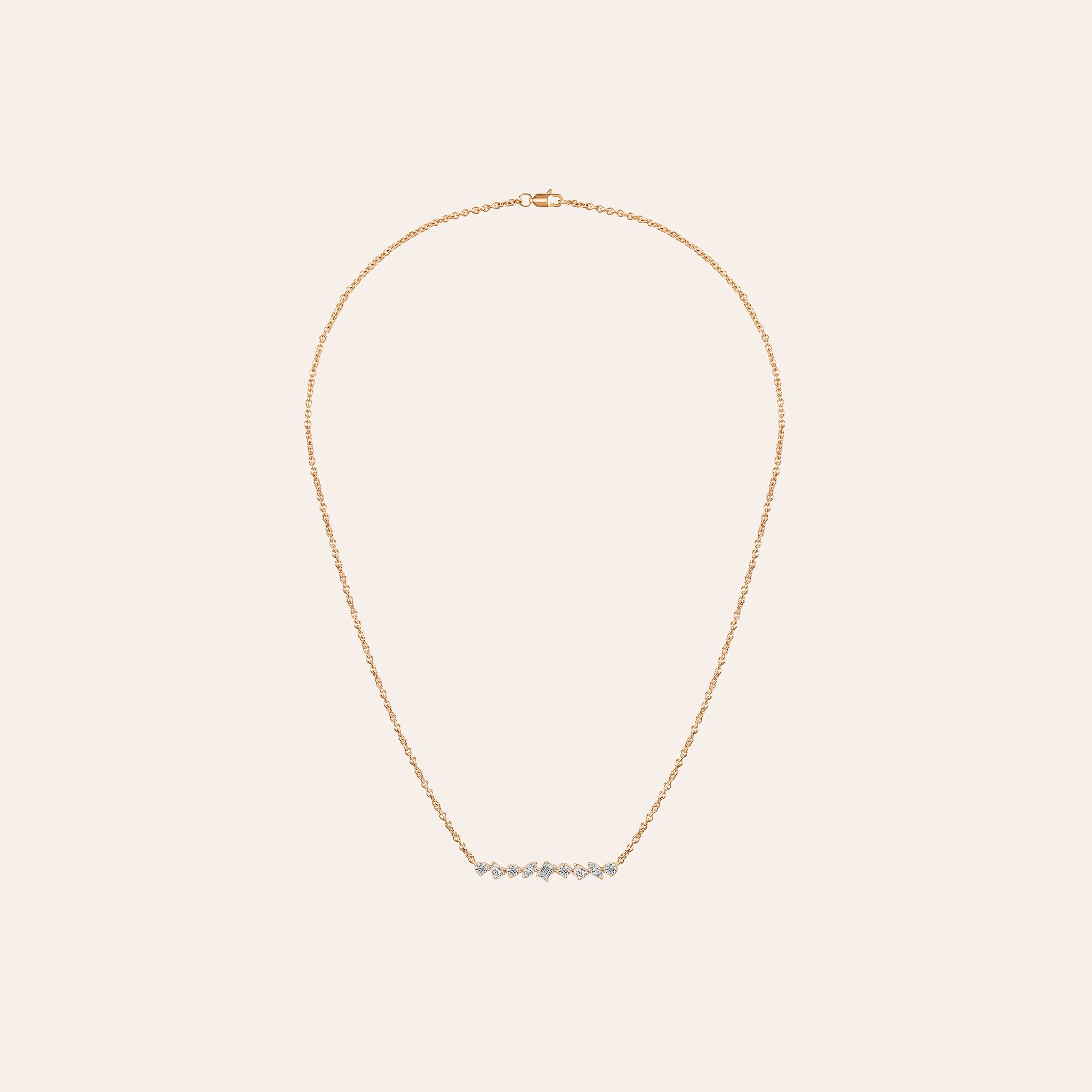 Multi-Shape Bar Pendant in 18k rose gold with round, pear, marquise, and baguette diamonds on an adjustable chain
