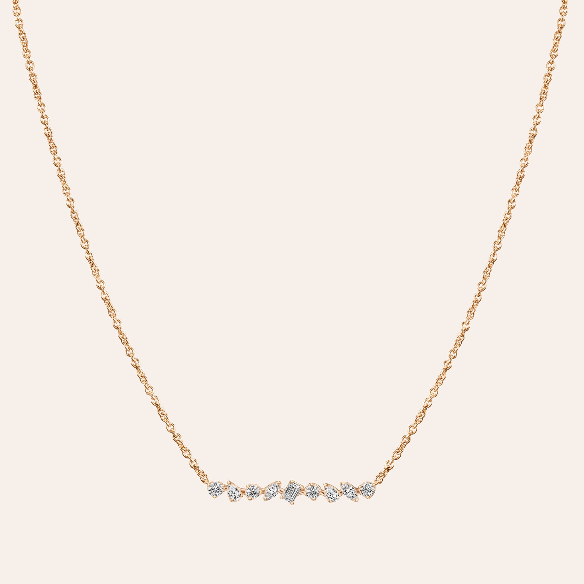 Multi-Shape Bar Pendant in 18k rose gold with round, pear, marquise, and baguette diamonds on an adjustable chain
