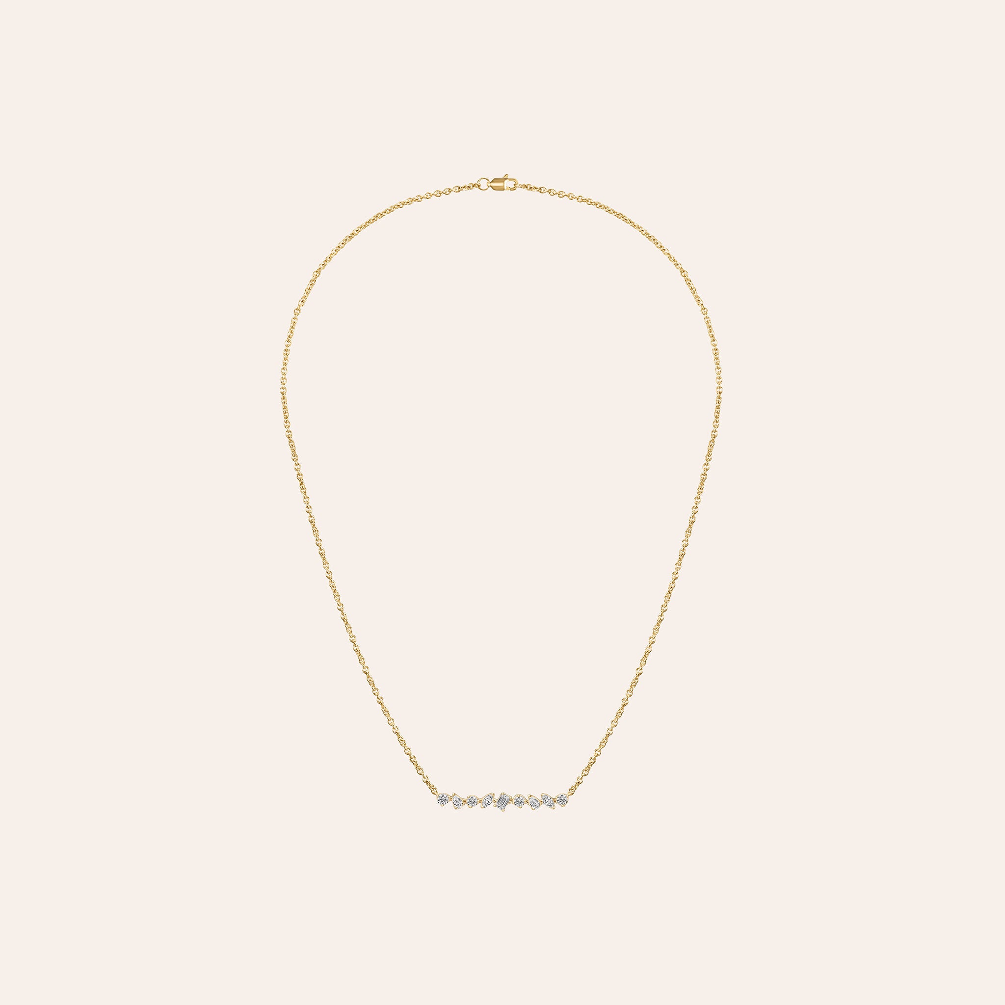 Multi-Shape Bar Pendant in 18k yellow gold with round, pear, marquise, and baguette diamonds on an adjustable chain
