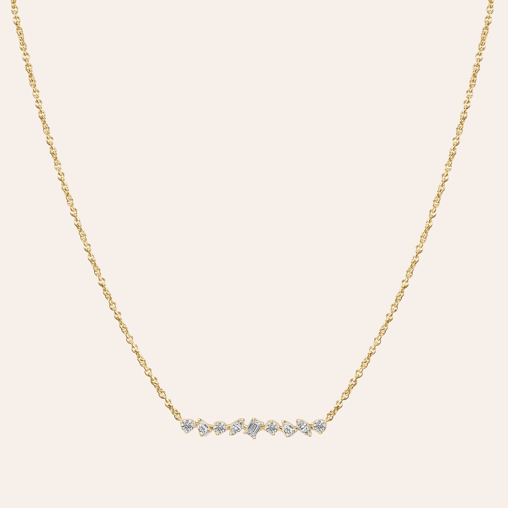 Multi-Shape Bar Pendant in 18k yellow gold with round, pear, marquise, and baguette diamonds on an adjustable chain
