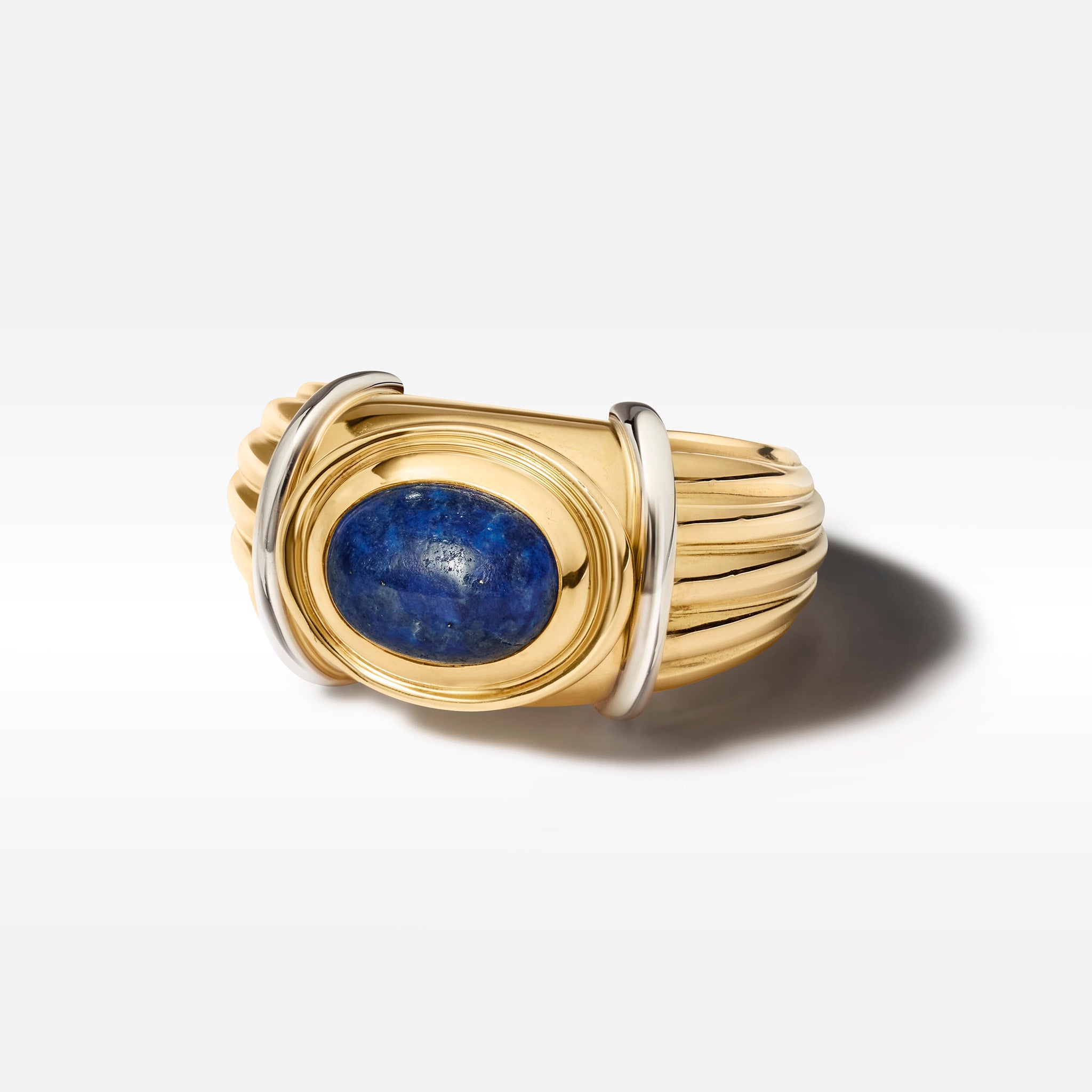 Vintage Boucheron 18K yellow and white gold ring with a cabochon lapis lazuli stone