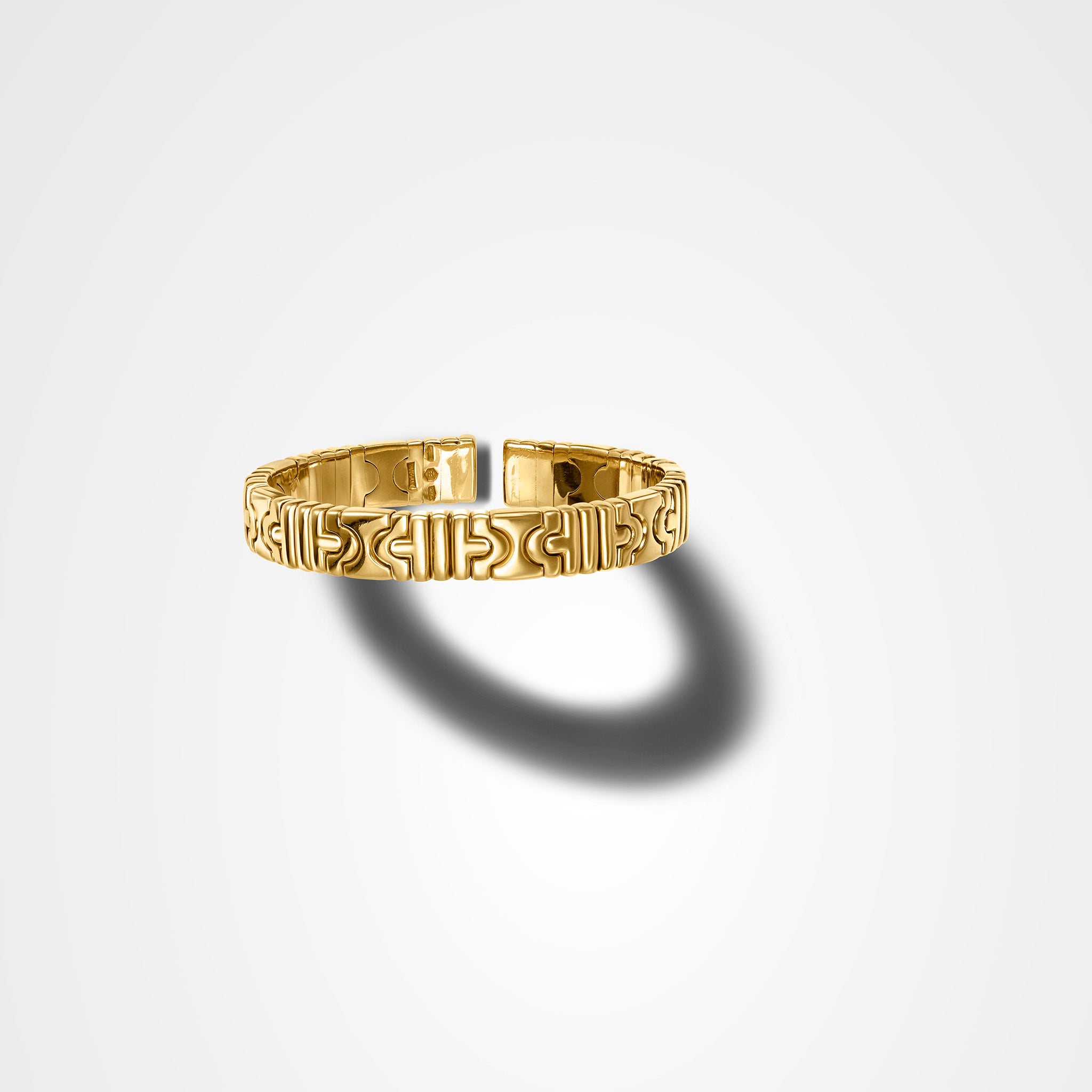Vintage Bvlgari Parentesi thin cuff bracelet in 18K yellow gold with interlocking curved links