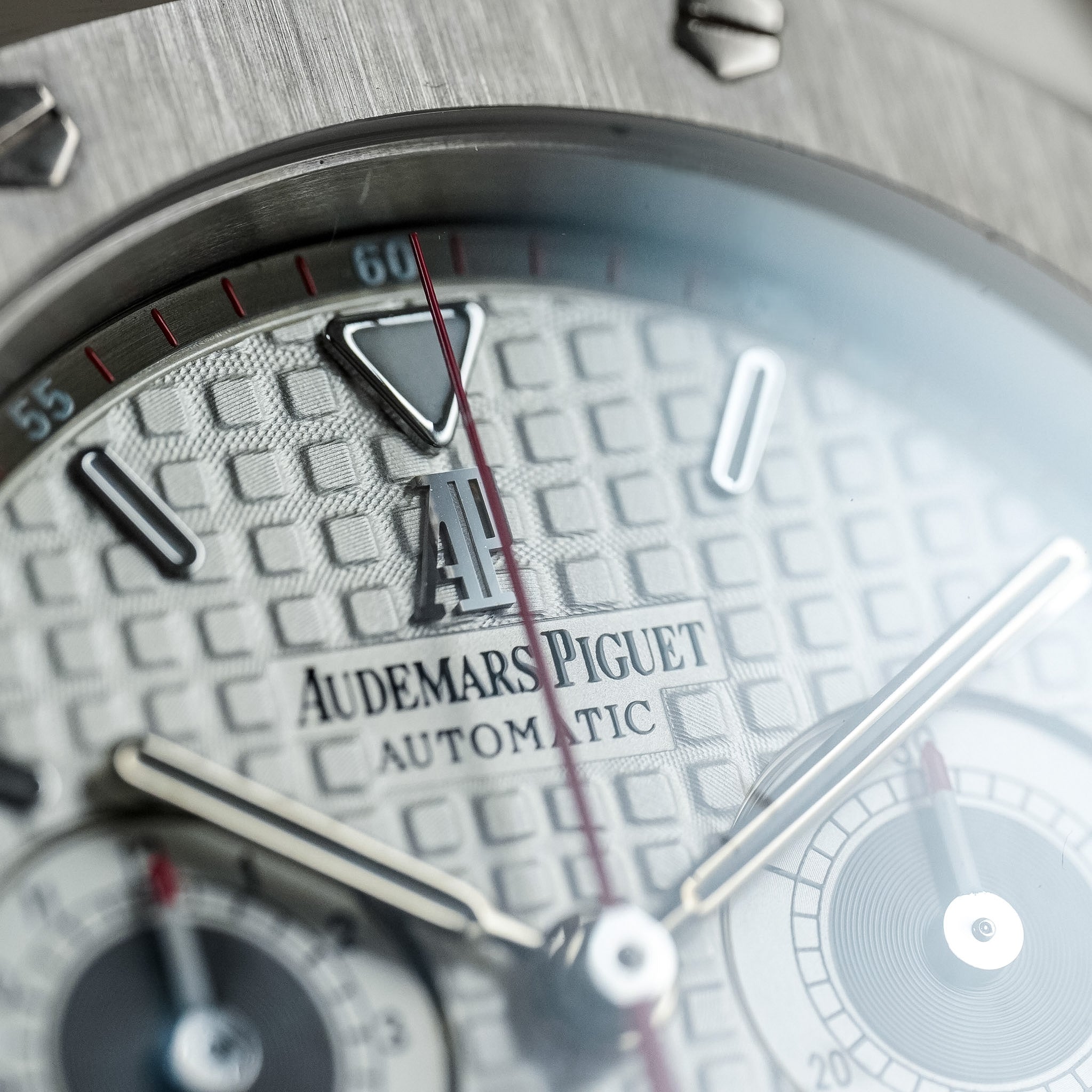 Close-up of a watch face with 'Audemars Piguet' branding