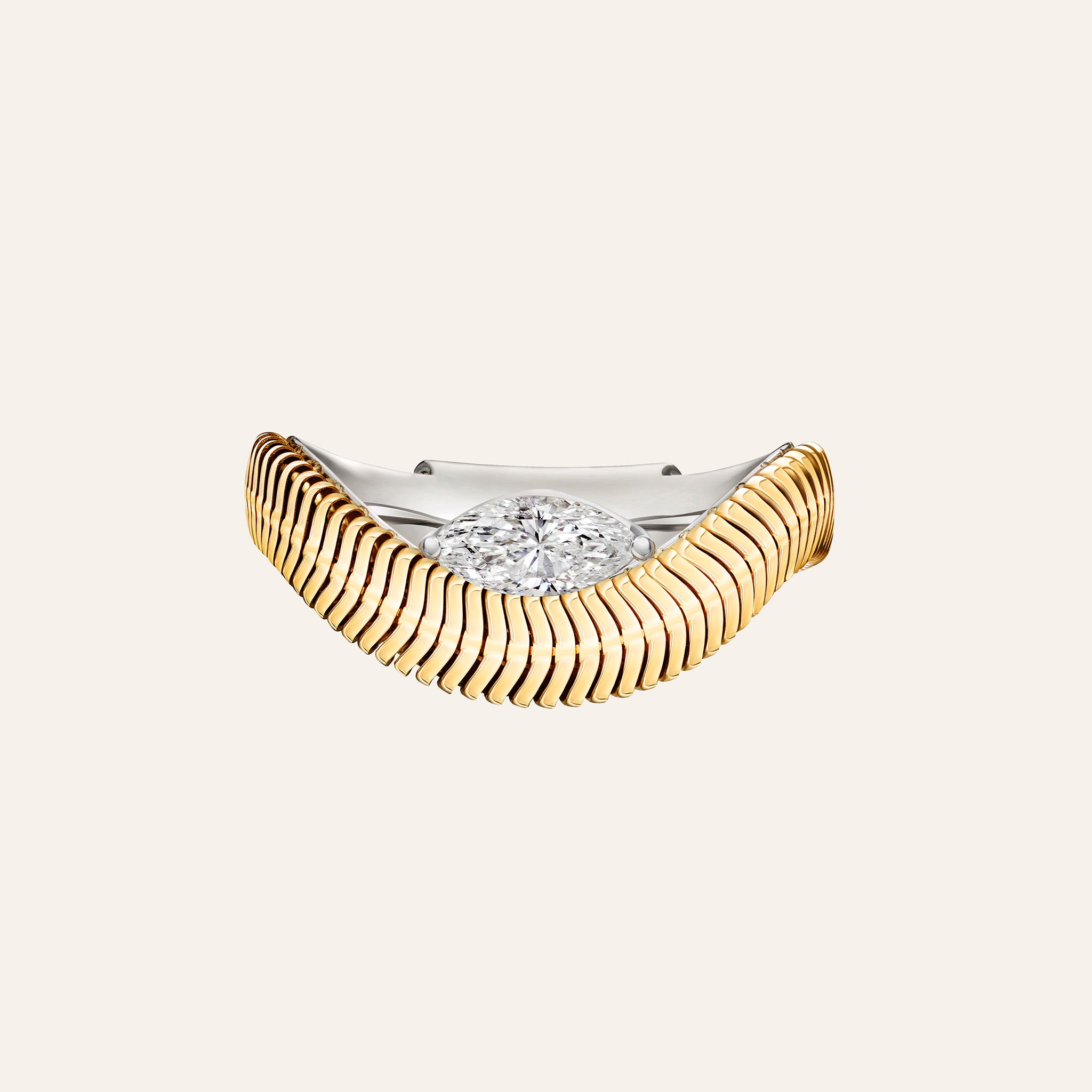Nikos Koulis Feelings Gold Chain & Marquise Diamond Ring in 18K gold, with a marquise diamond paired with a curving chain band, shown against a cream background.